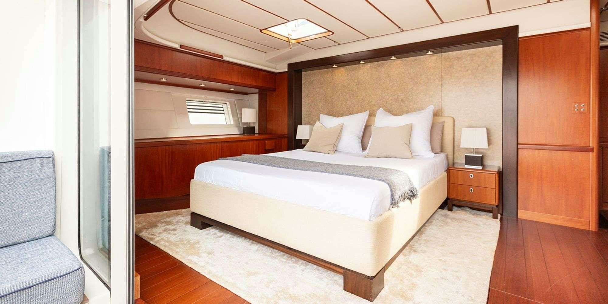 a bed in a room aboard SELENA Yacht for Charter