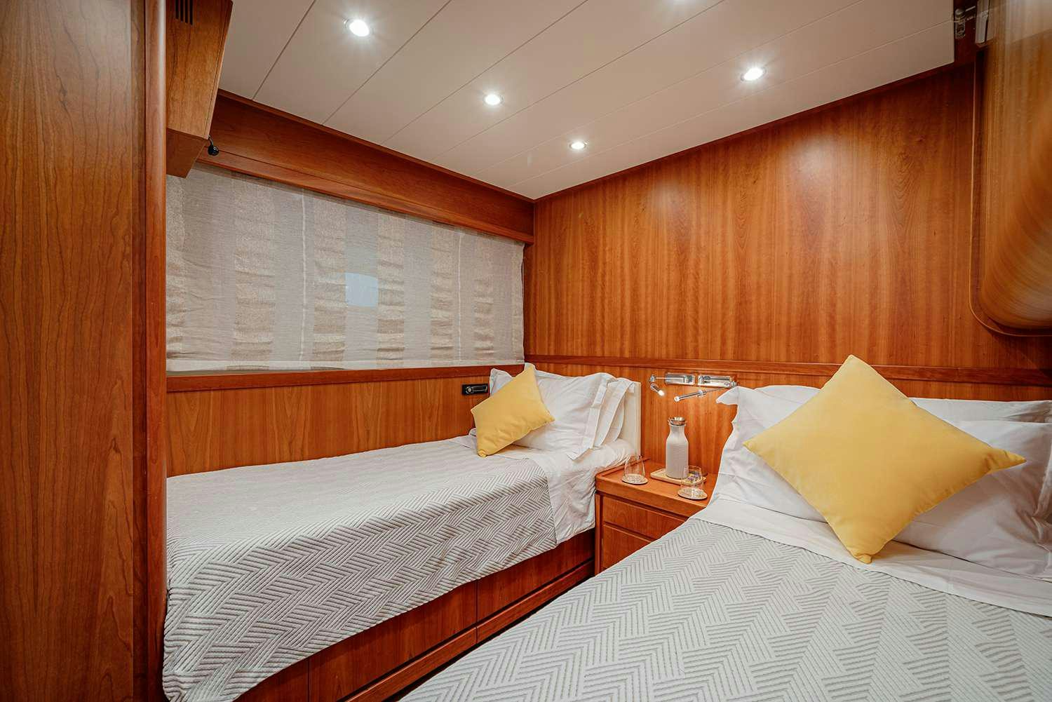 a room with two beds aboard ROCK MOON Yacht for Charter
