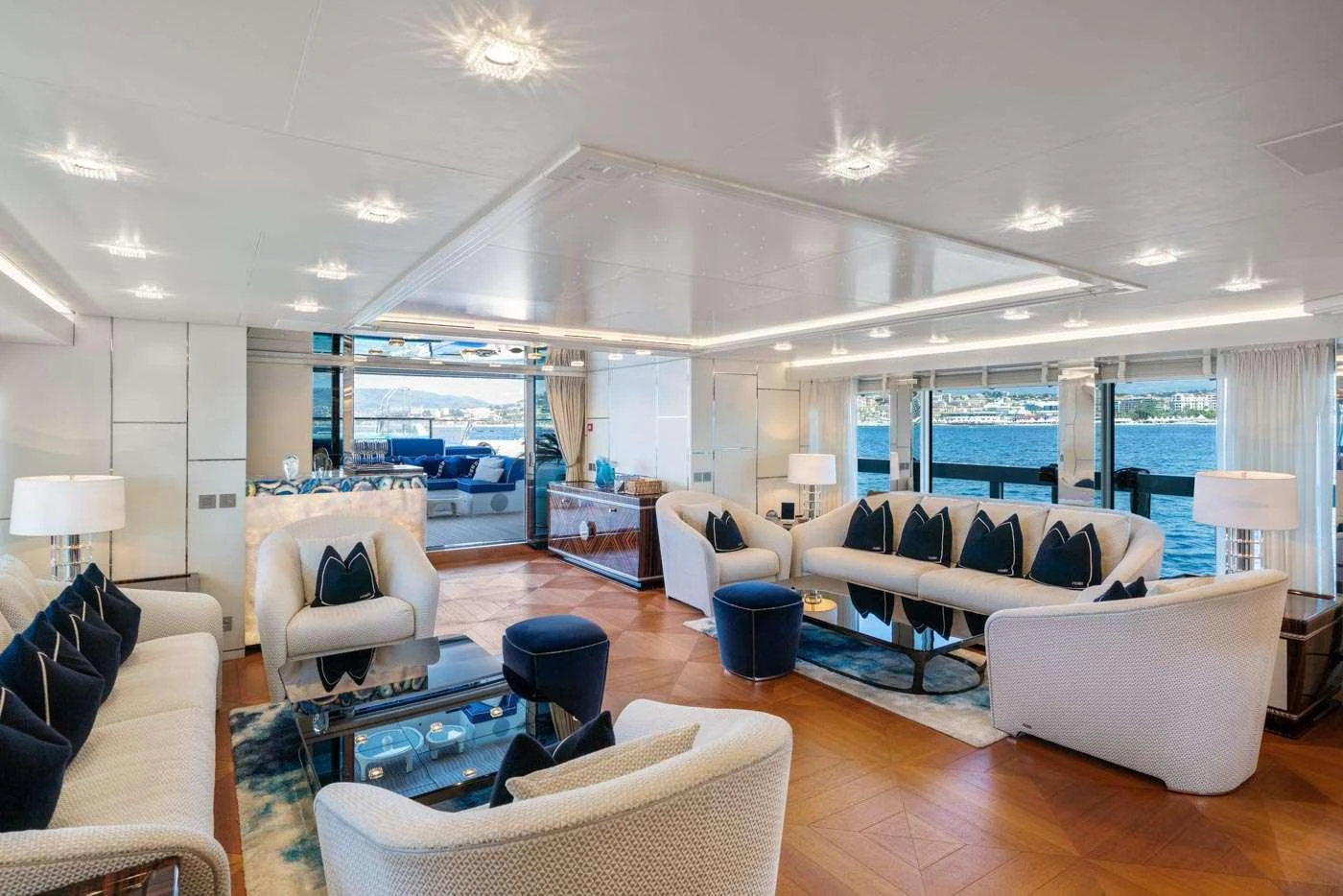 a living room with a large window aboard ALULIM Yacht for Charter