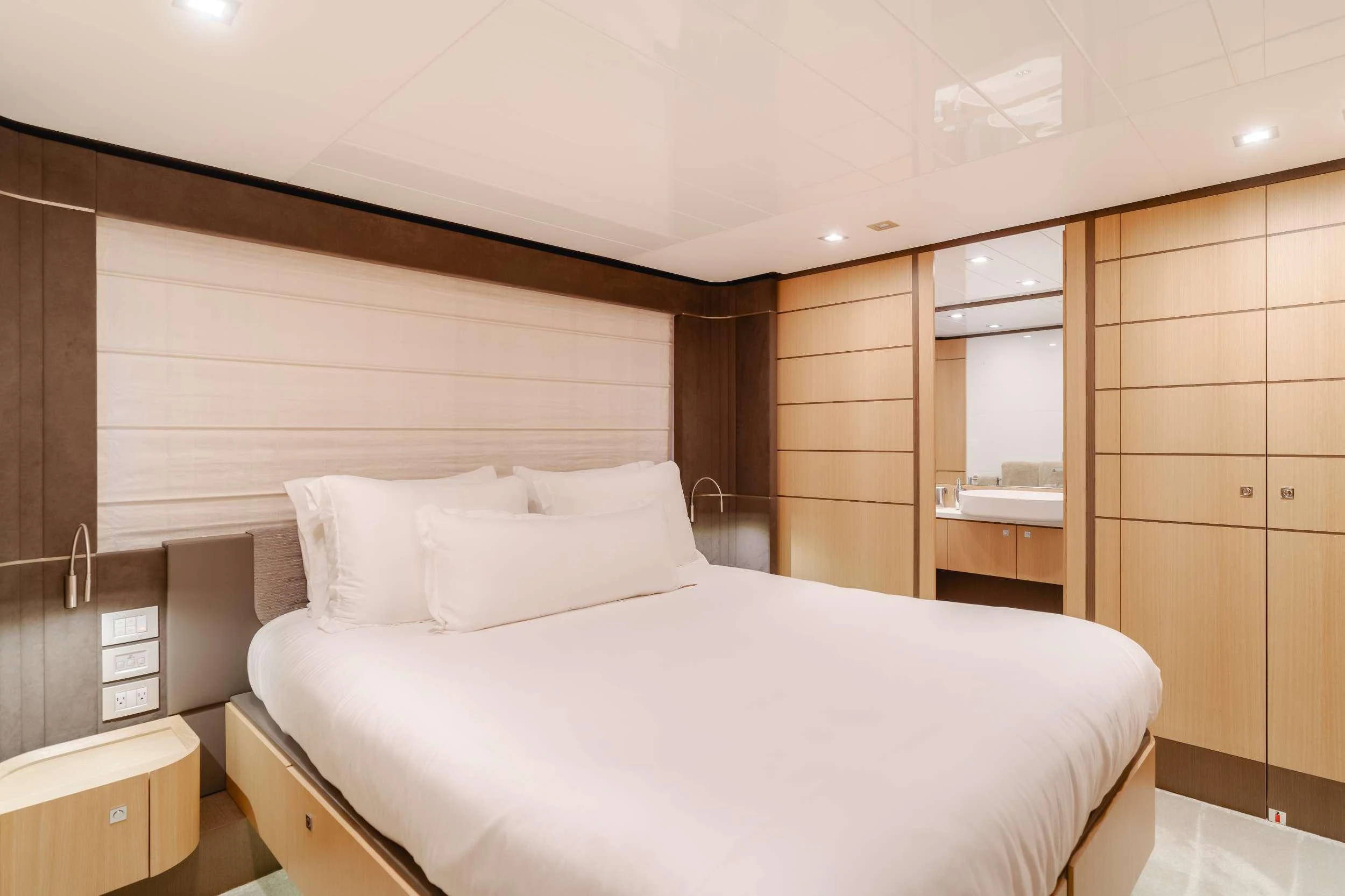 a bed in a room aboard SOL SHINE Yacht for Charter