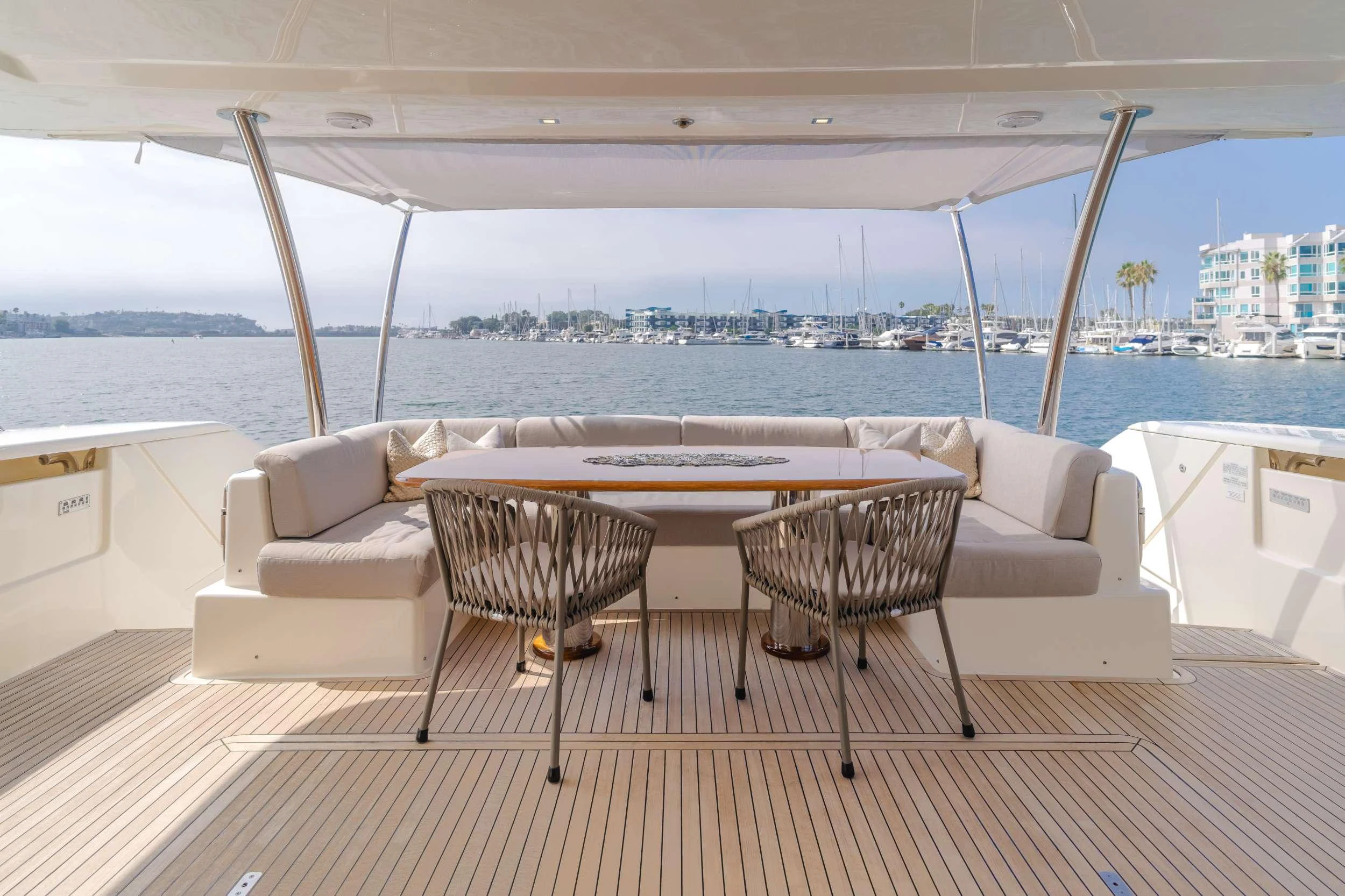 a table and chairs on a deck aboard SOL SHINE Yacht for Charter