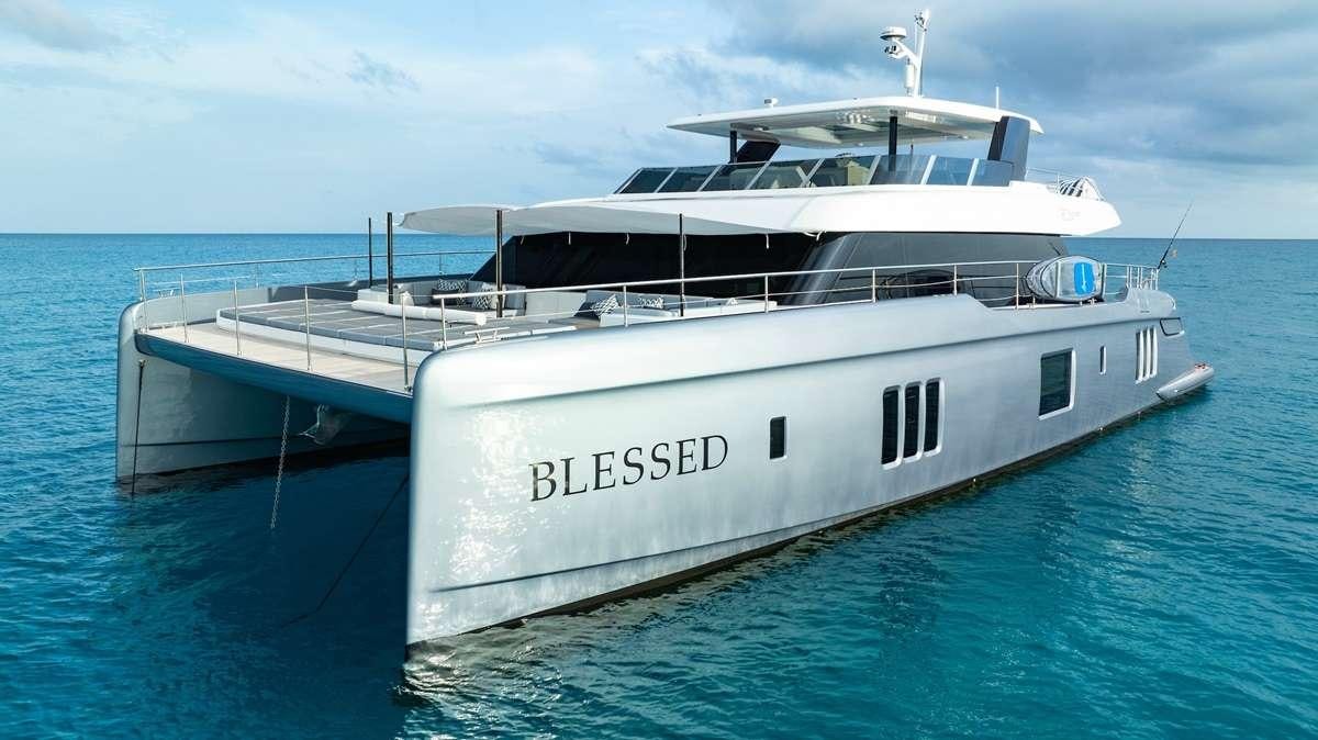 a white boat in the water aboard BLESSED Yacht for Charter
