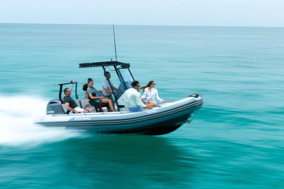 a group of people in a boat aboard BLESSED Yacht for Charter