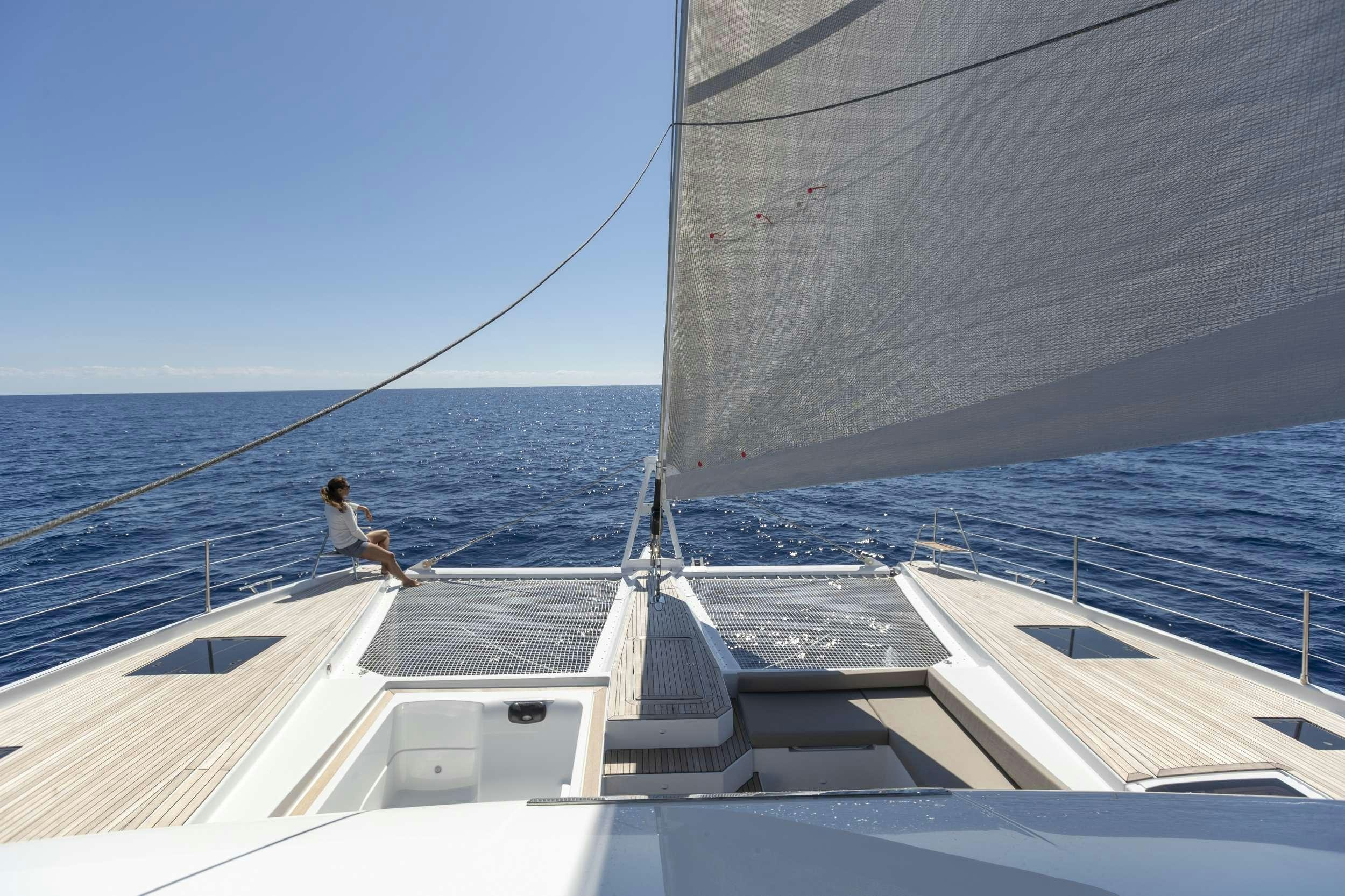 a person sitting on a boat aboard FLORAMYE Yacht for Charter
