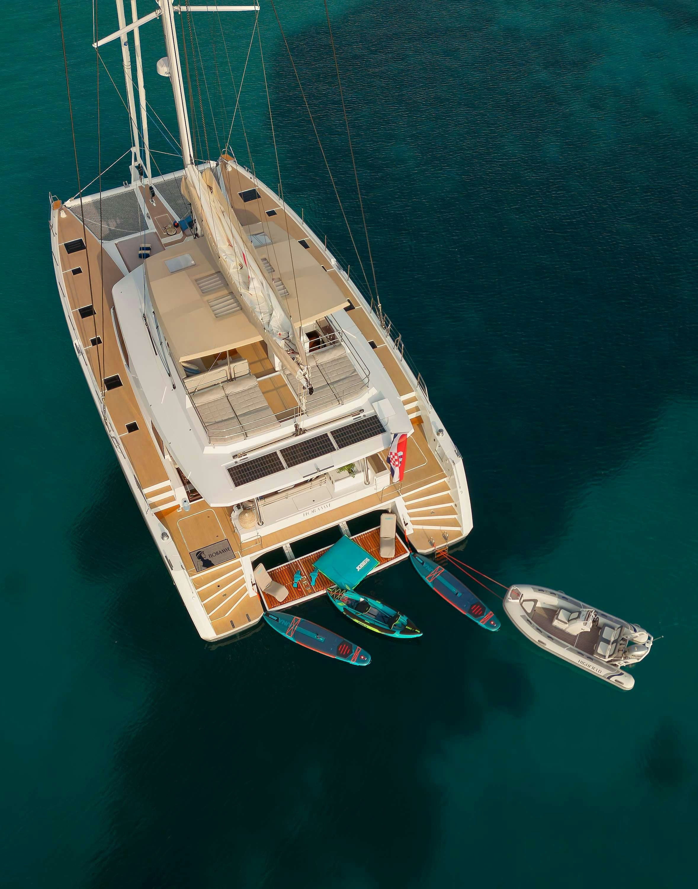 a large boat in the water aboard FLORAMYE Yacht for Charter