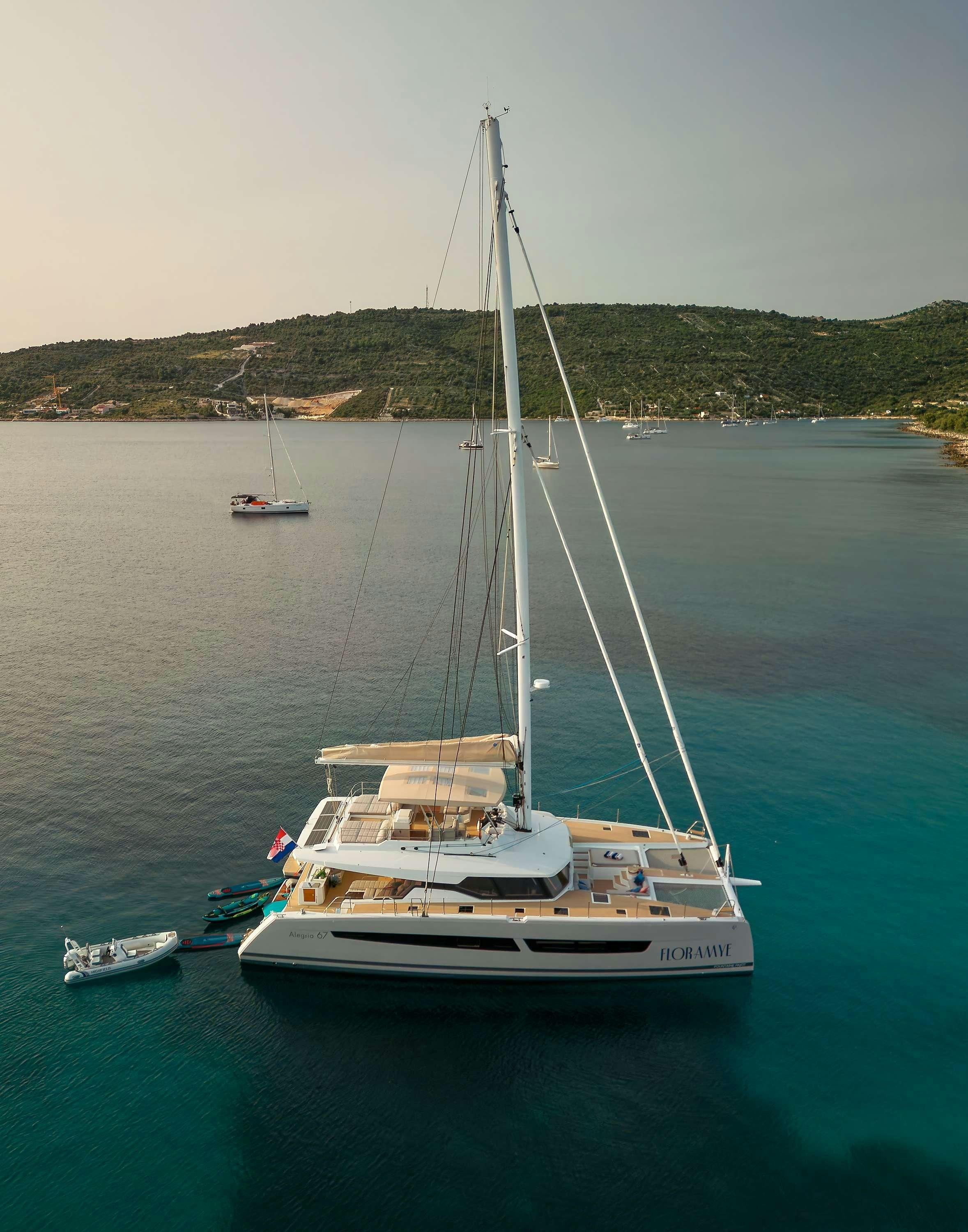 a boat sailing on the water aboard FLORAMYE Yacht for Charter
