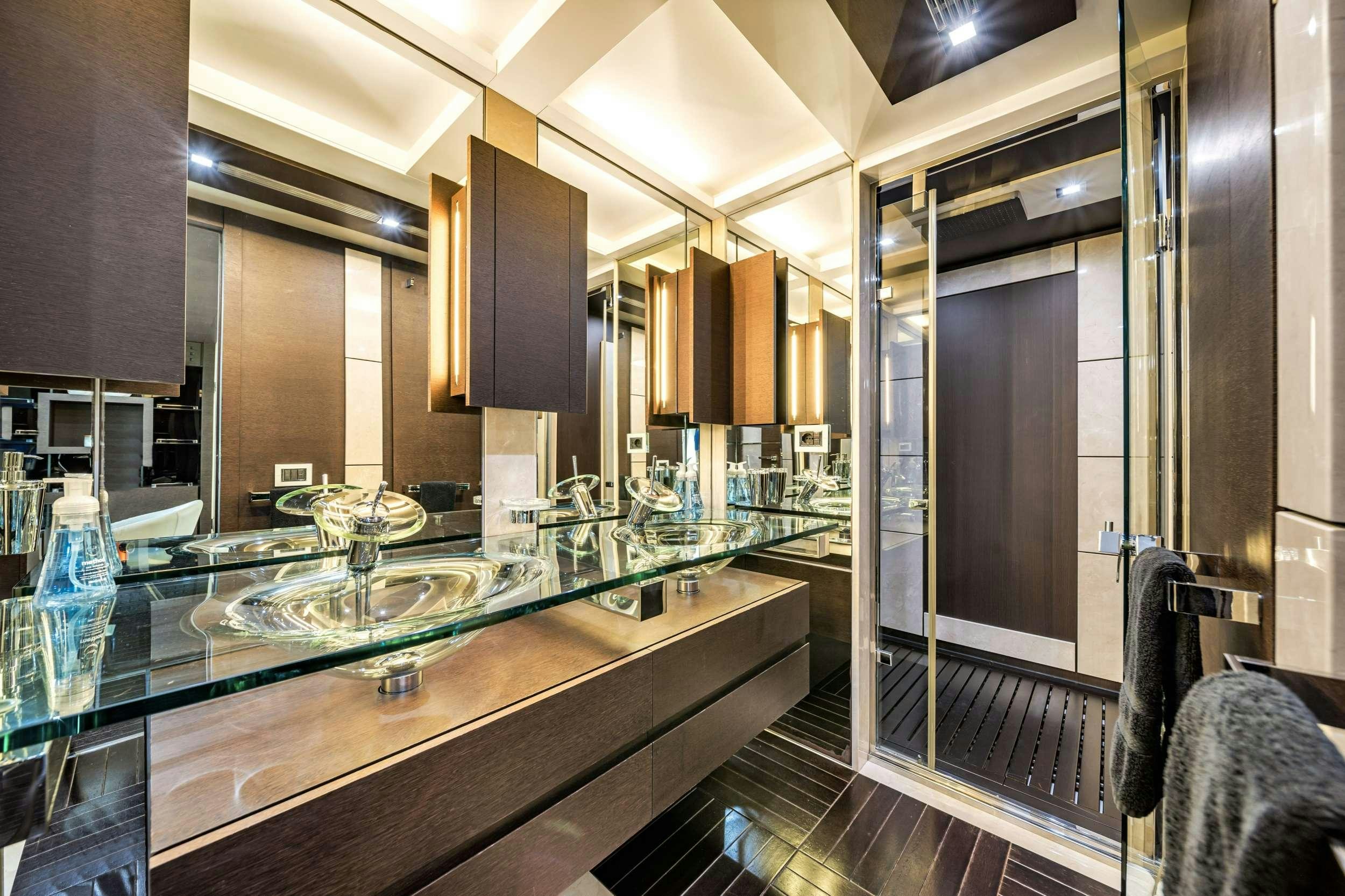 a large kitchen with glass sinks aboard SETTE Yacht for Charter
