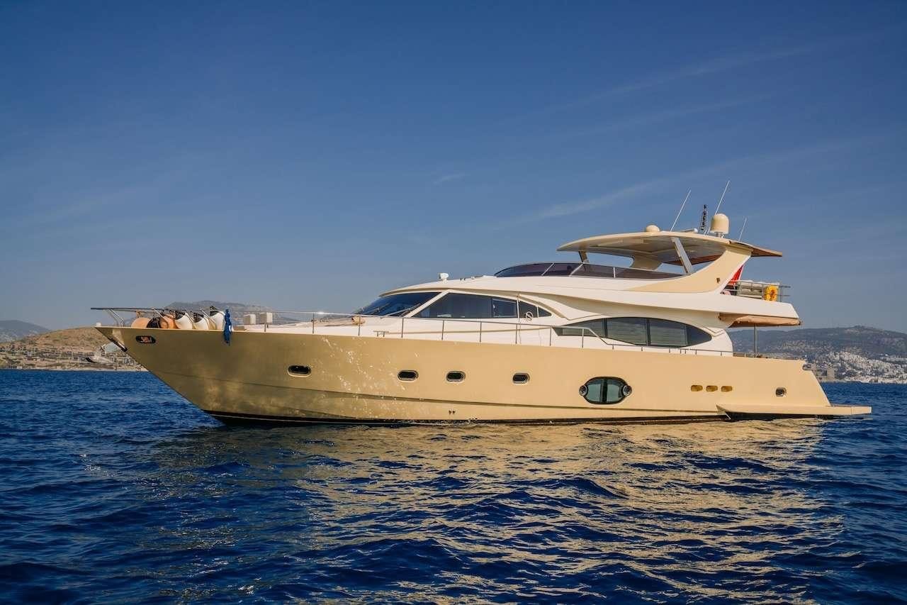 a boat in the water aboard REIS Yacht for Charter