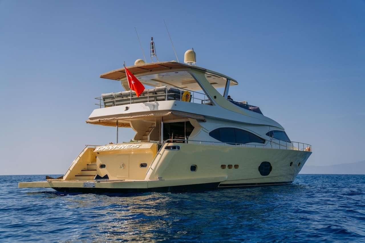 a boat in the water aboard REIS Yacht for Charter