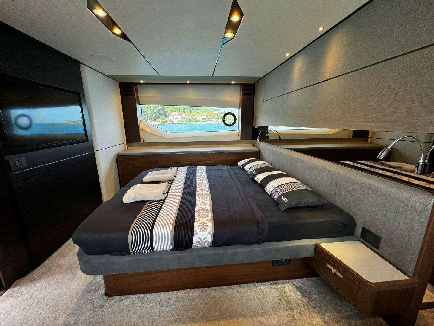 a bed in a room aboard MALUHIA Yacht for Charter