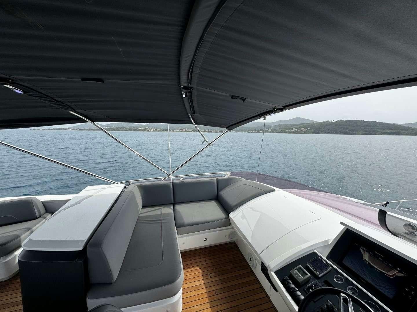 a boat on a deck aboard MALUHIA Yacht for Charter