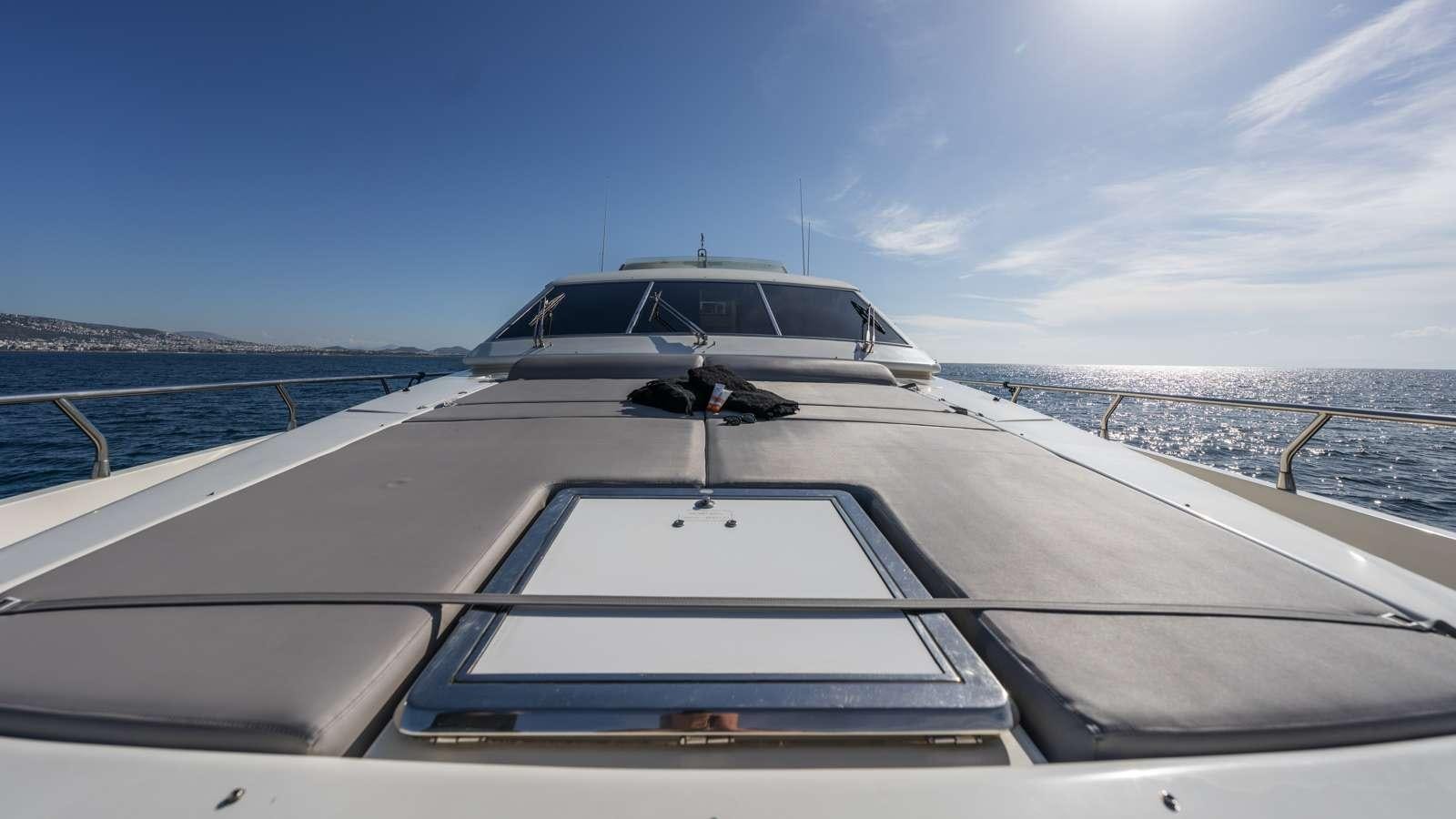 a white car on a boat aboard ALFA Yacht for Charter