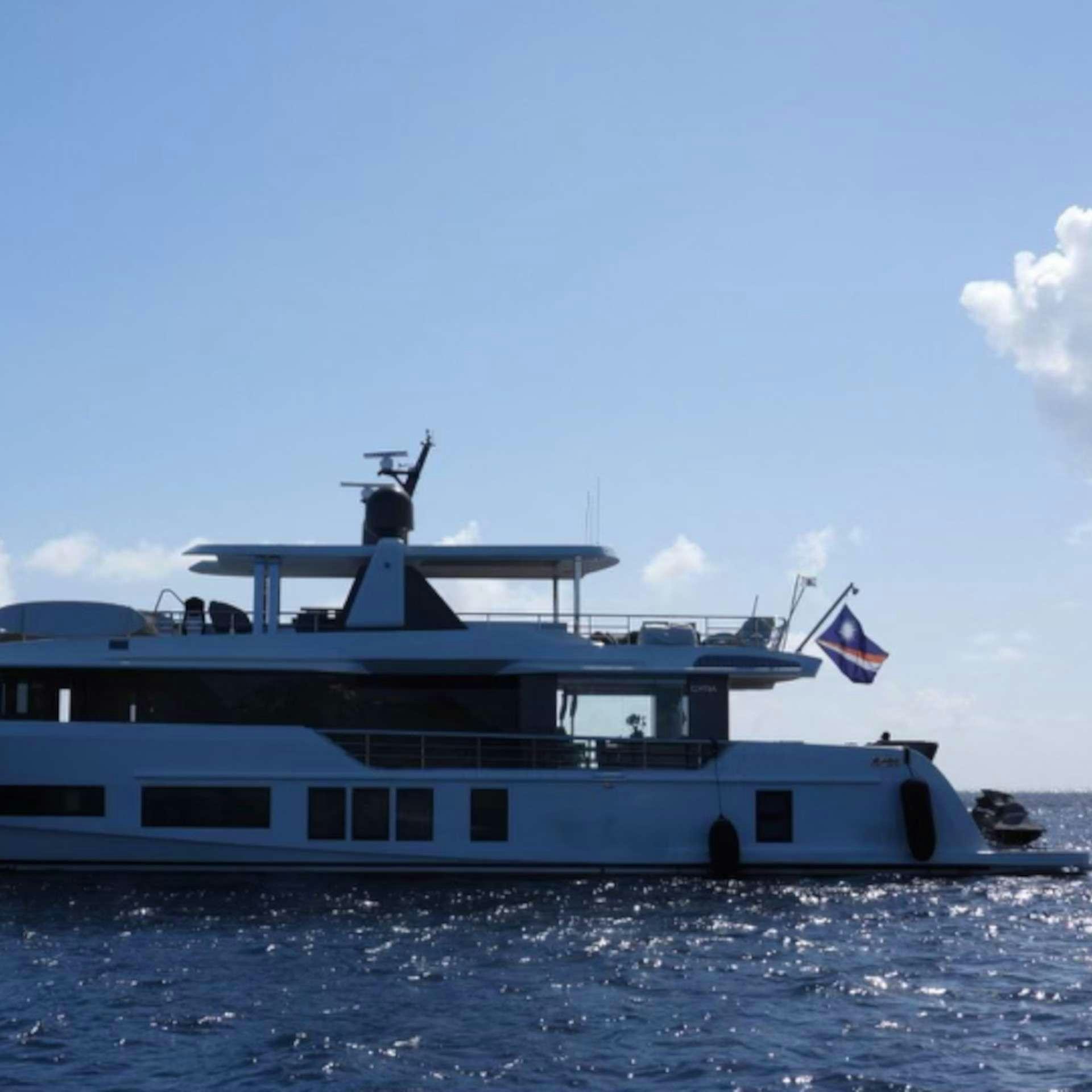 a large boat in the water aboard CYRA Yacht for Charter