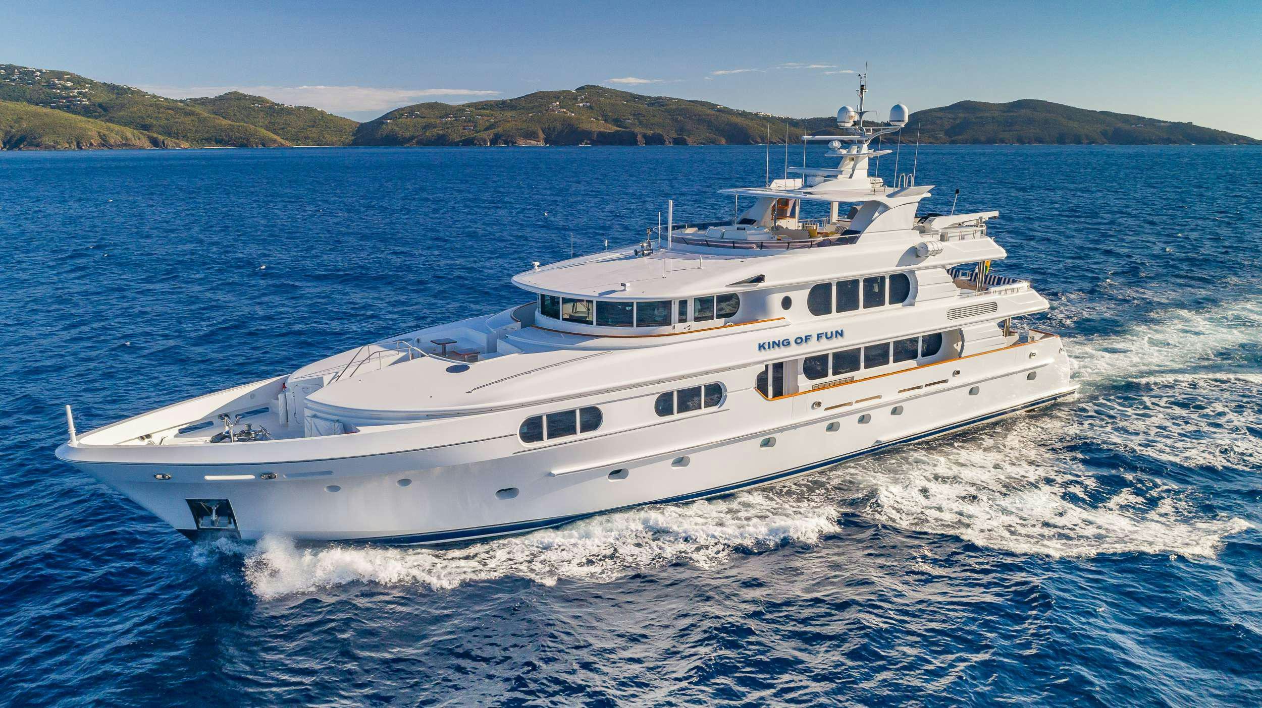 a white boat on the water aboard KING OF FUN Yacht for Charter