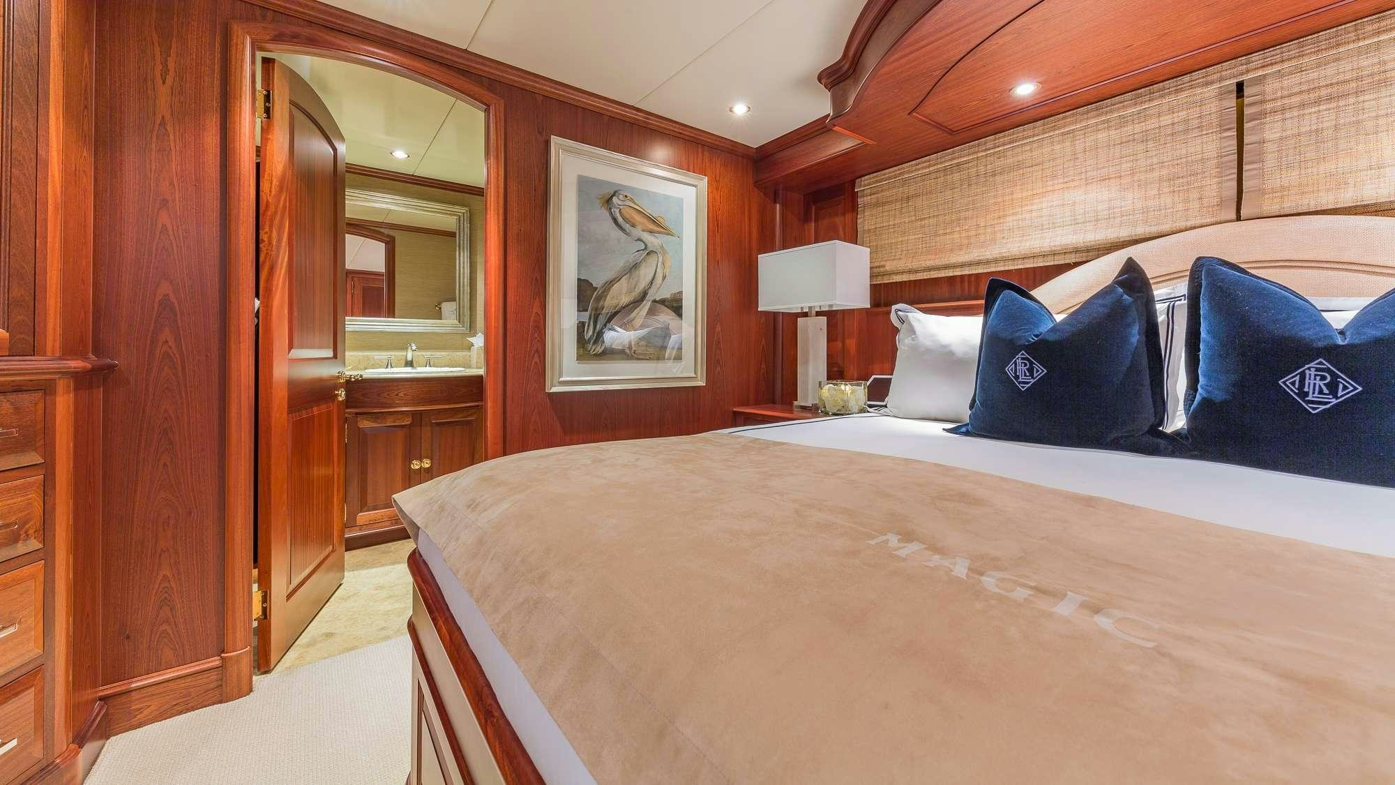 a bed in a room aboard KING OF FUN Yacht for Charter