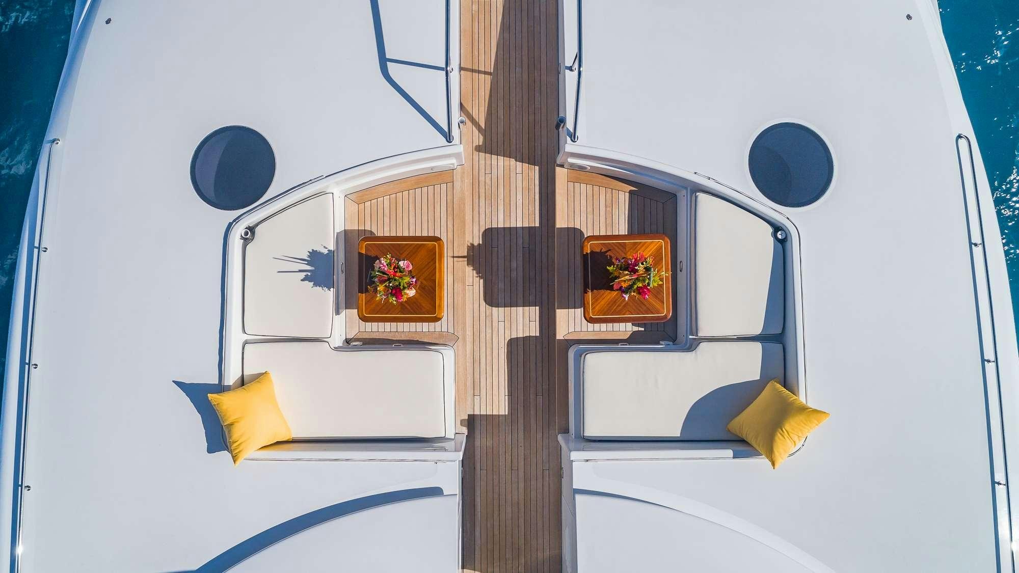 a room with a wood floor and a painting on the wall aboard KING OF FUN Yacht for Charter