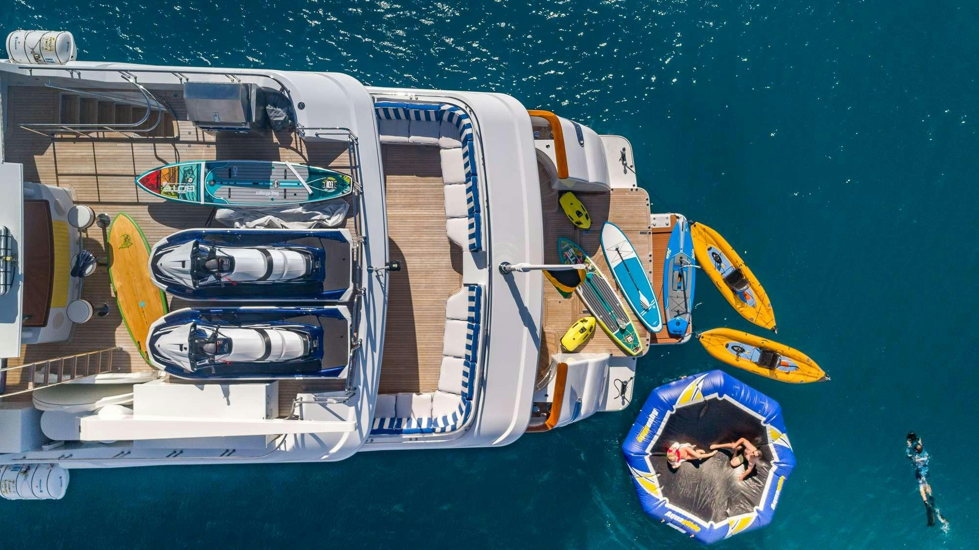 a boat with a person in it aboard KING OF FUN Yacht for Charter