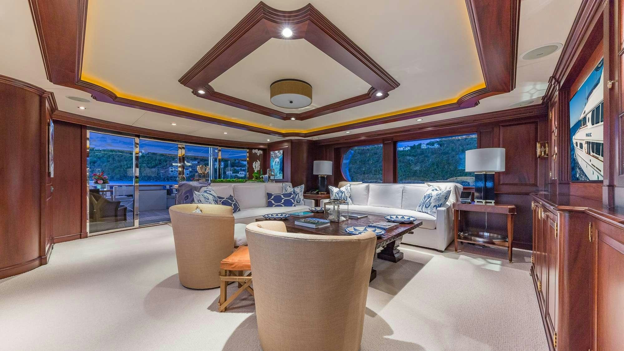 a living room with a large ceiling aboard KING OF FUN Yacht for Charter