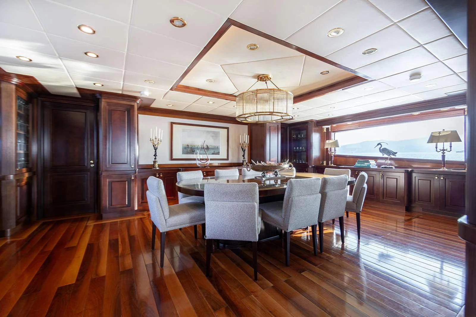 a large kitchen with a dining table aboard SOPHIE BLUE Yacht for Charter