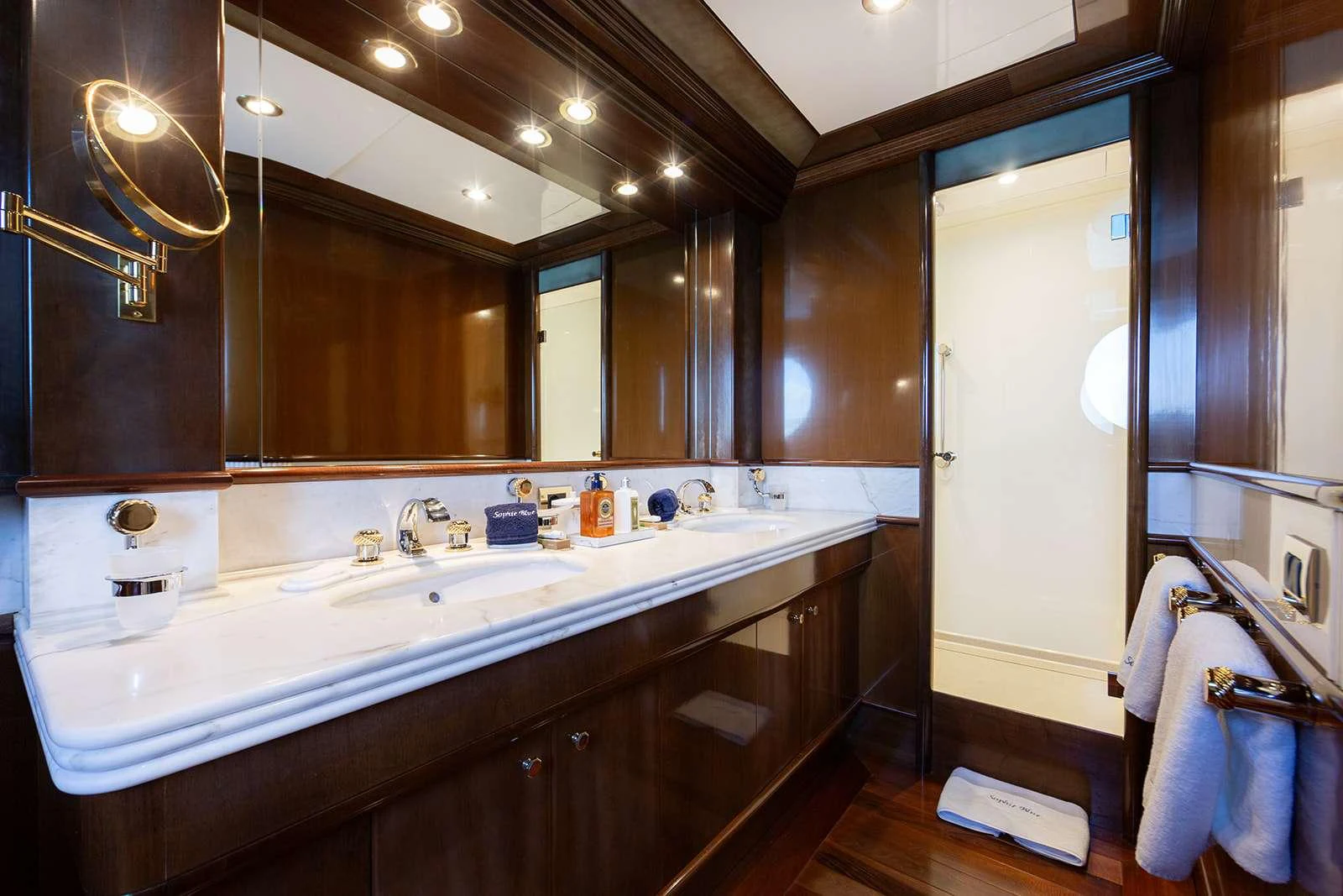 a bathroom with a large mirror aboard SOPHIE BLUE Yacht for Charter
