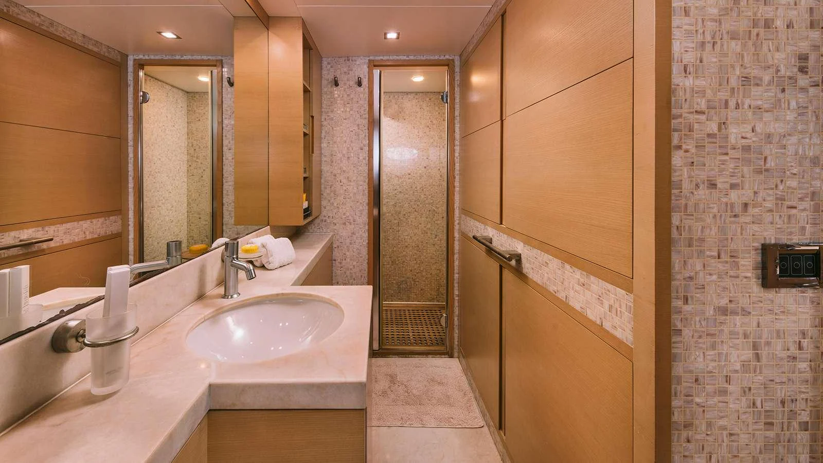 a bathroom with a sink and a mirror aboard SEAS THE DAY Yacht for Charter