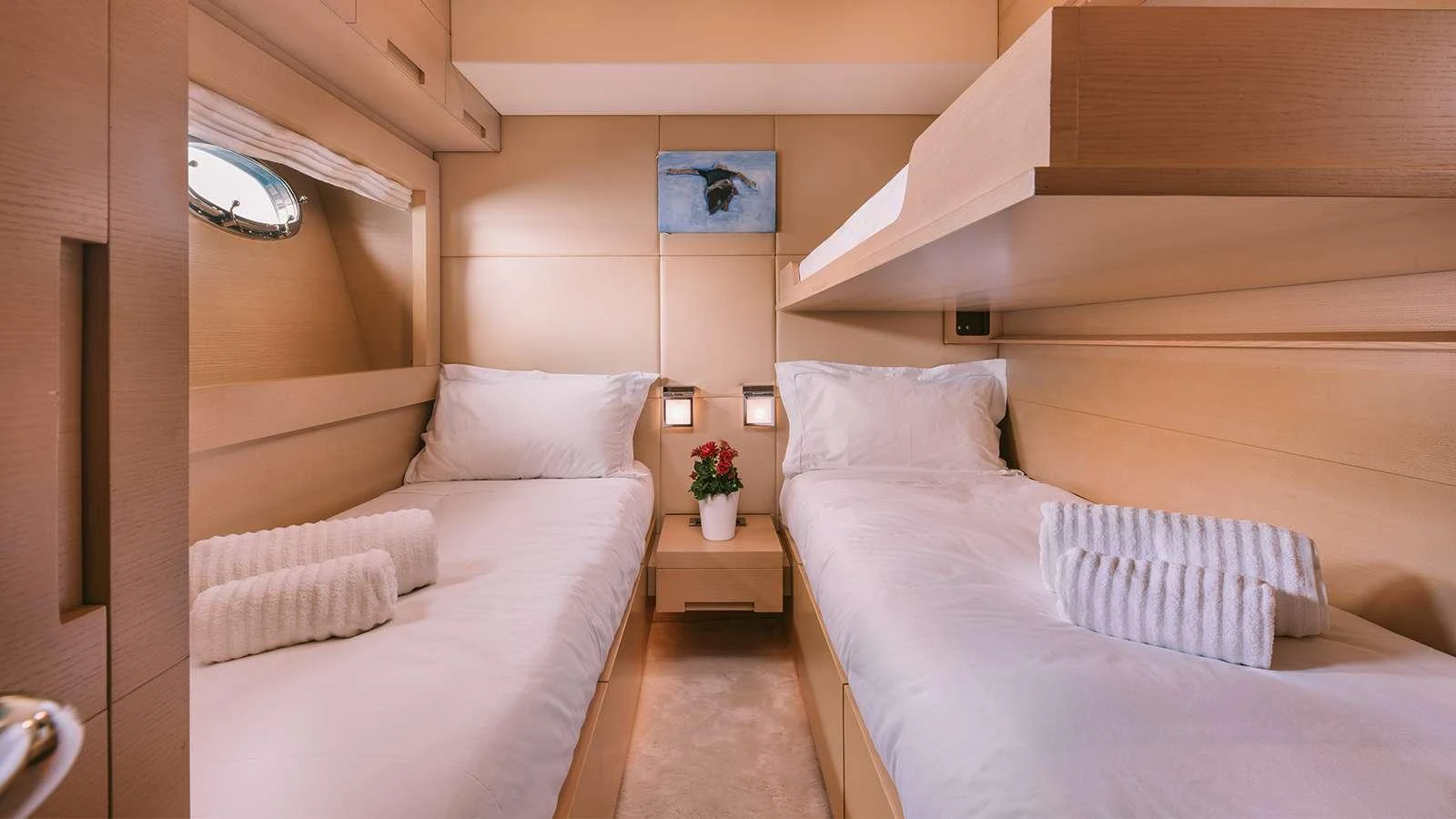 a room with two beds aboard SEAS THE DAY Yacht for Charter