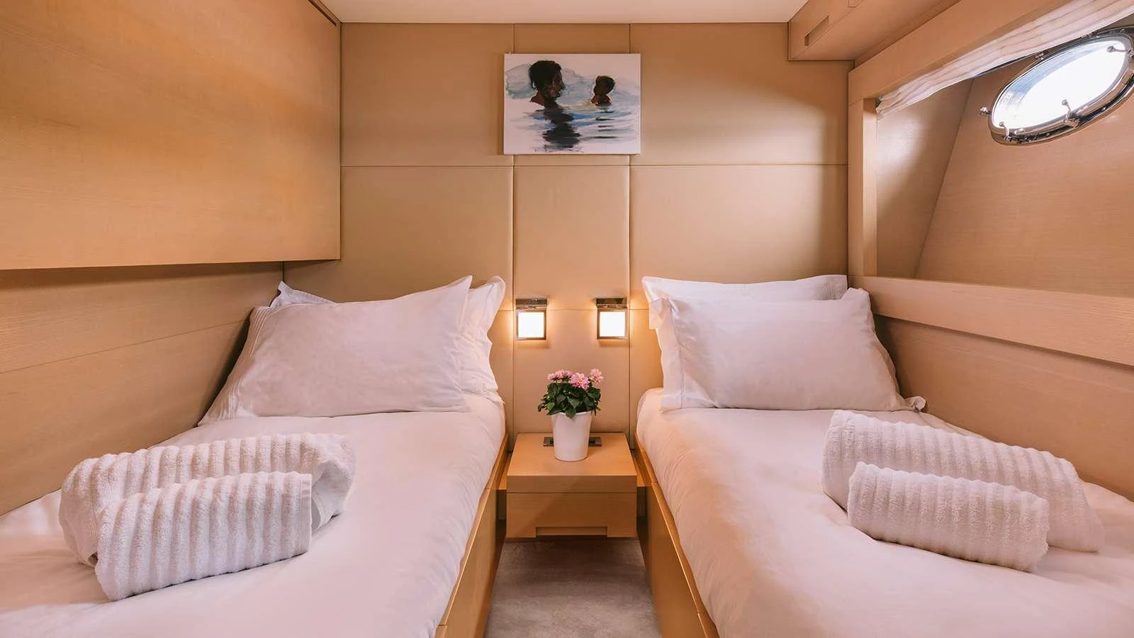 a room with two beds aboard SEAS THE DAY Yacht for Charter
