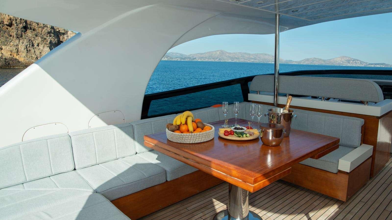 a table with food on it aboard EL PECADO Yacht for Charter