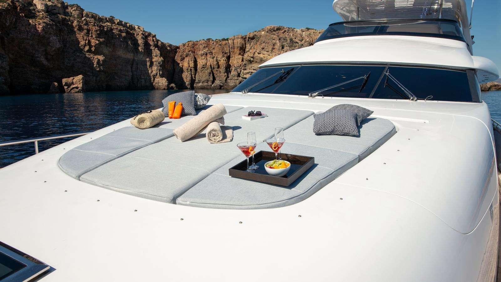 a boat on the water aboard EL PECADO Yacht for Charter