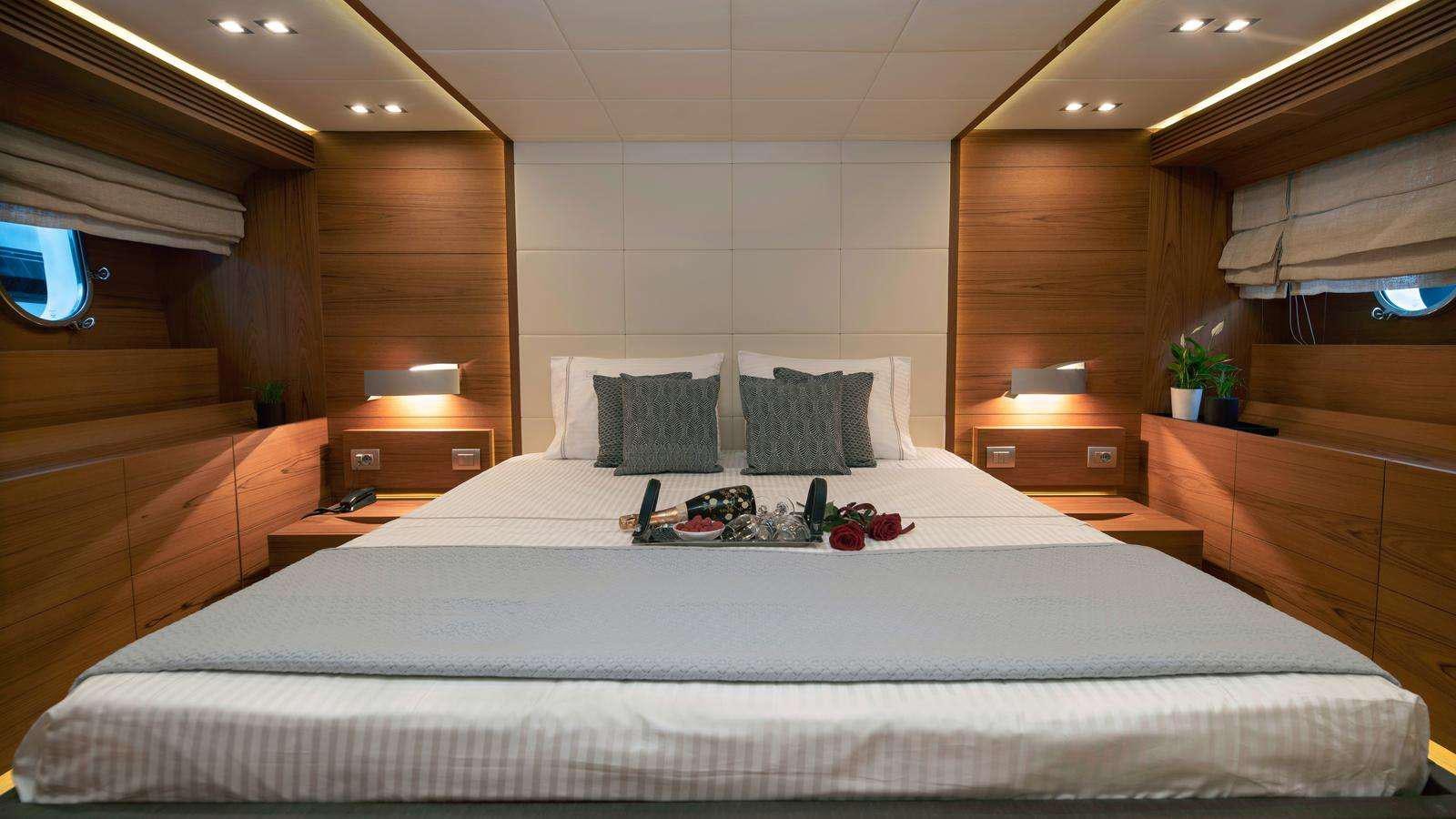 a bed in a room aboard EL PECADO Yacht for Charter