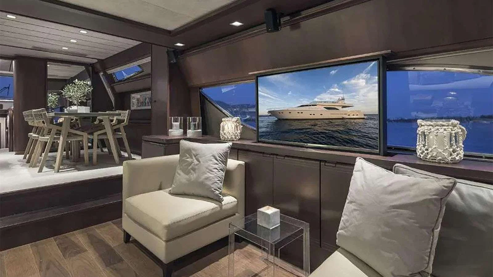 a living room with a large screen aboard LAZY DAYS Yacht for Charter