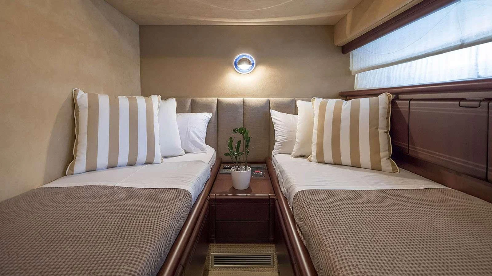 a room with two beds aboard LAZY DAYS Yacht for Charter