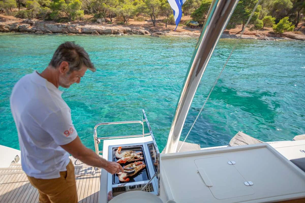 a man standing on a boat aboard MAJESTY OF GREECE Yacht for Charter