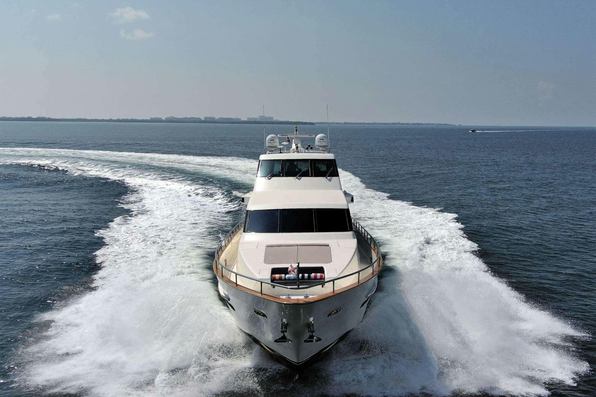 a boat on the water aboard THE USUAL Yacht for Charter