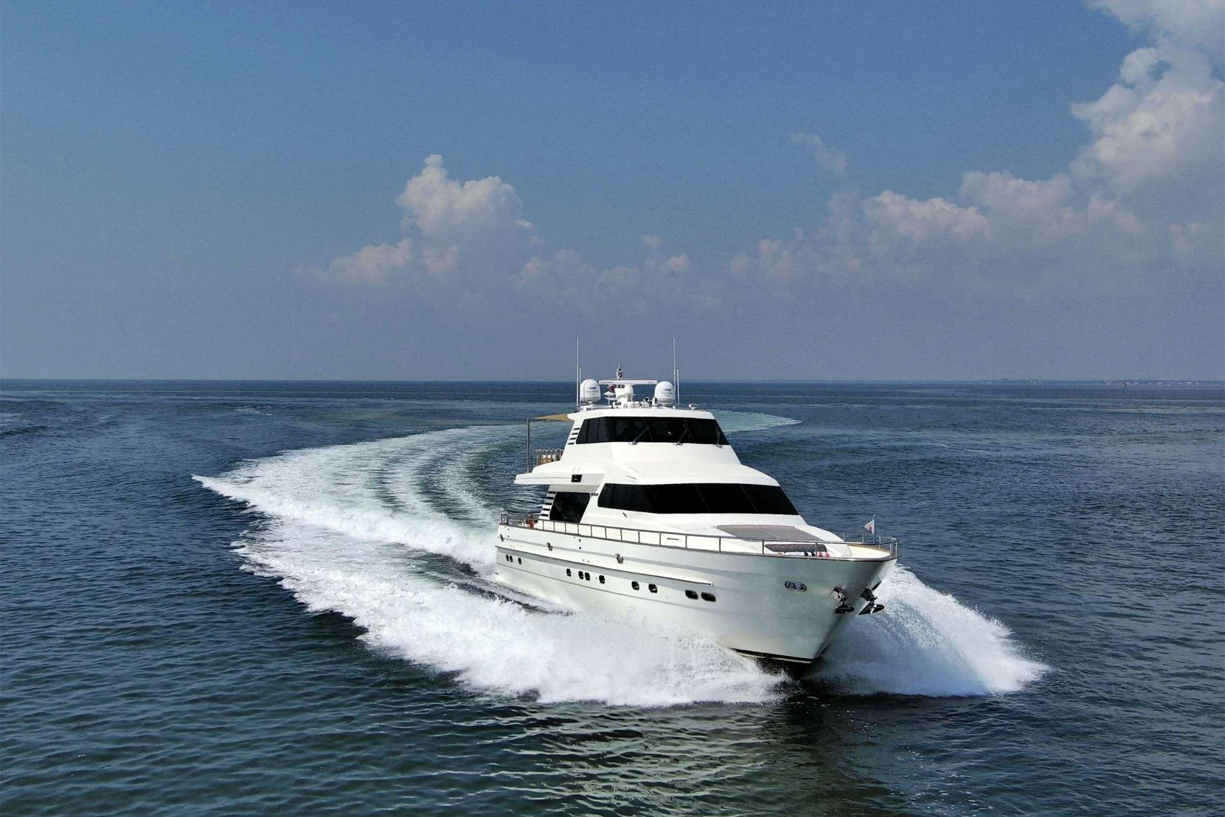 a white yacht in the water aboard THE USUAL Yacht for Charter