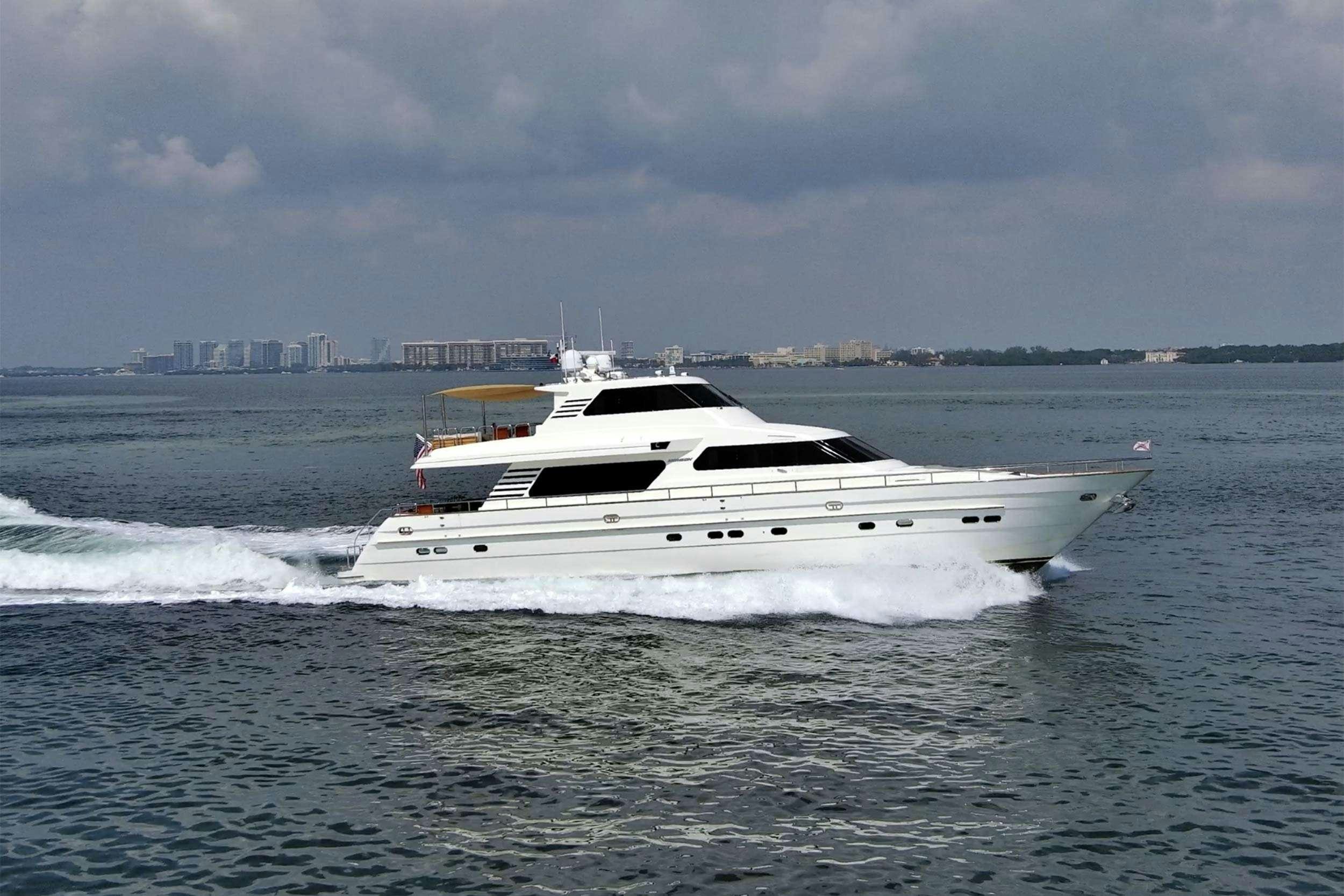 a white yacht on the water aboard THE USUAL Yacht for Charter