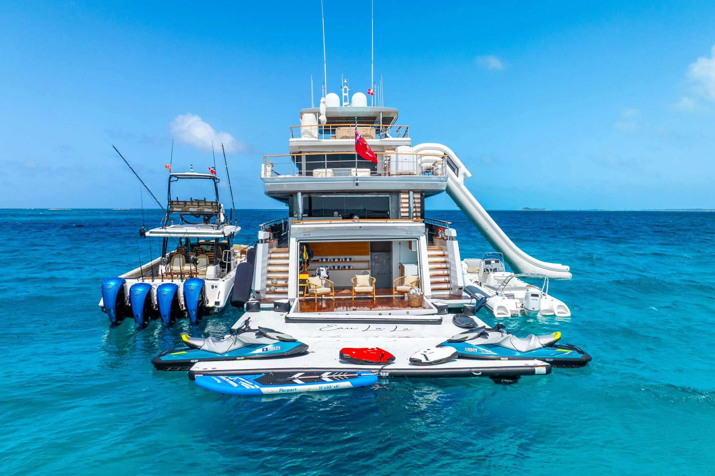a boat with a crane on it aboard EAU LA LA Yacht for Charter