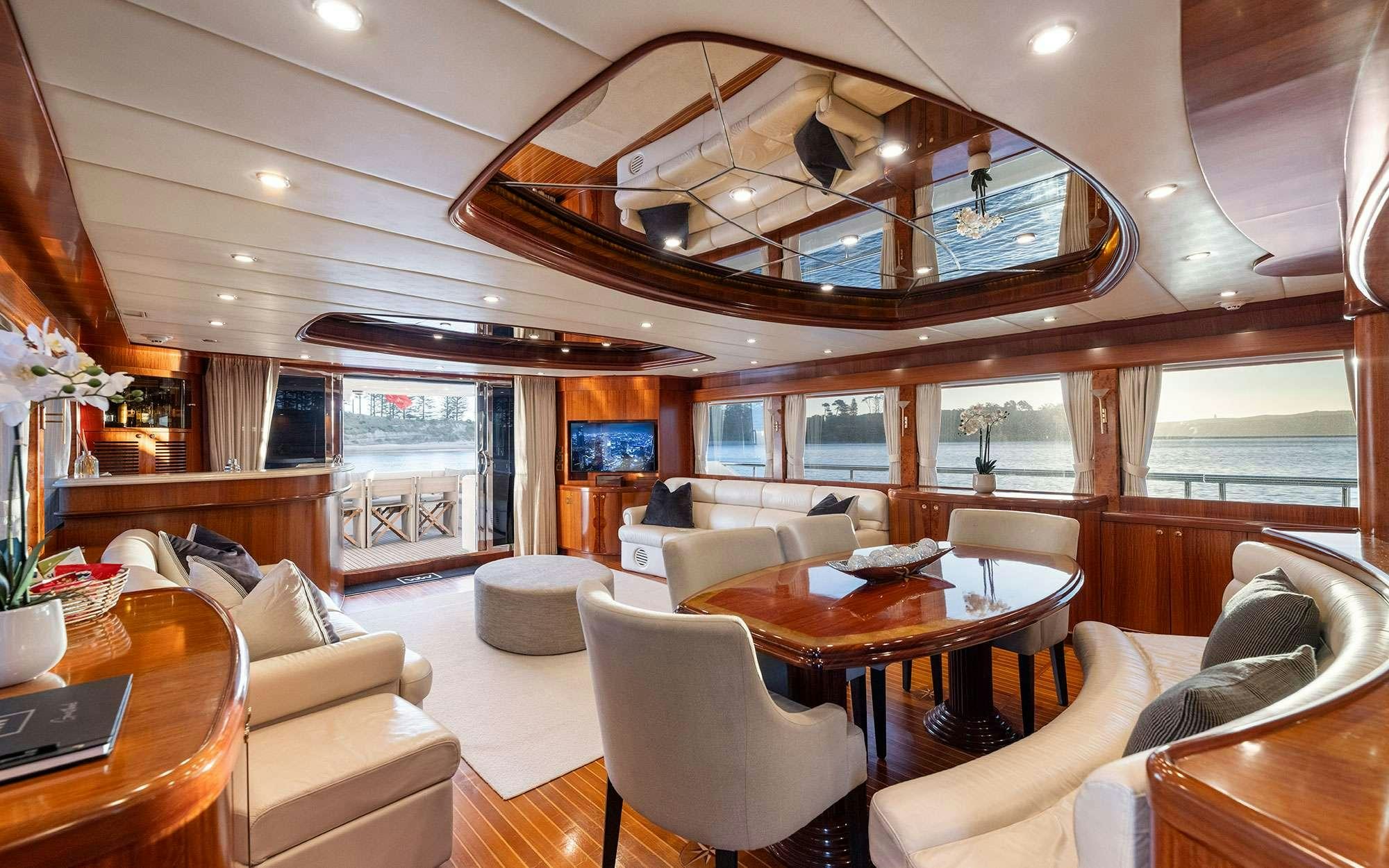 a living room with a large open window aboard WW Yacht for Charter