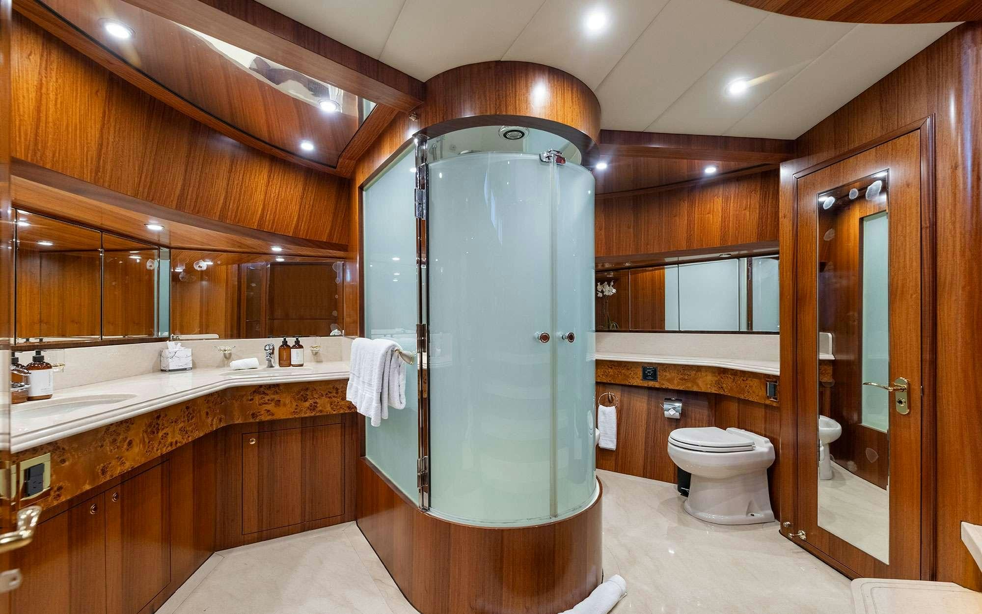 a bathroom with a large shower unit aboard WW Yacht for Charter