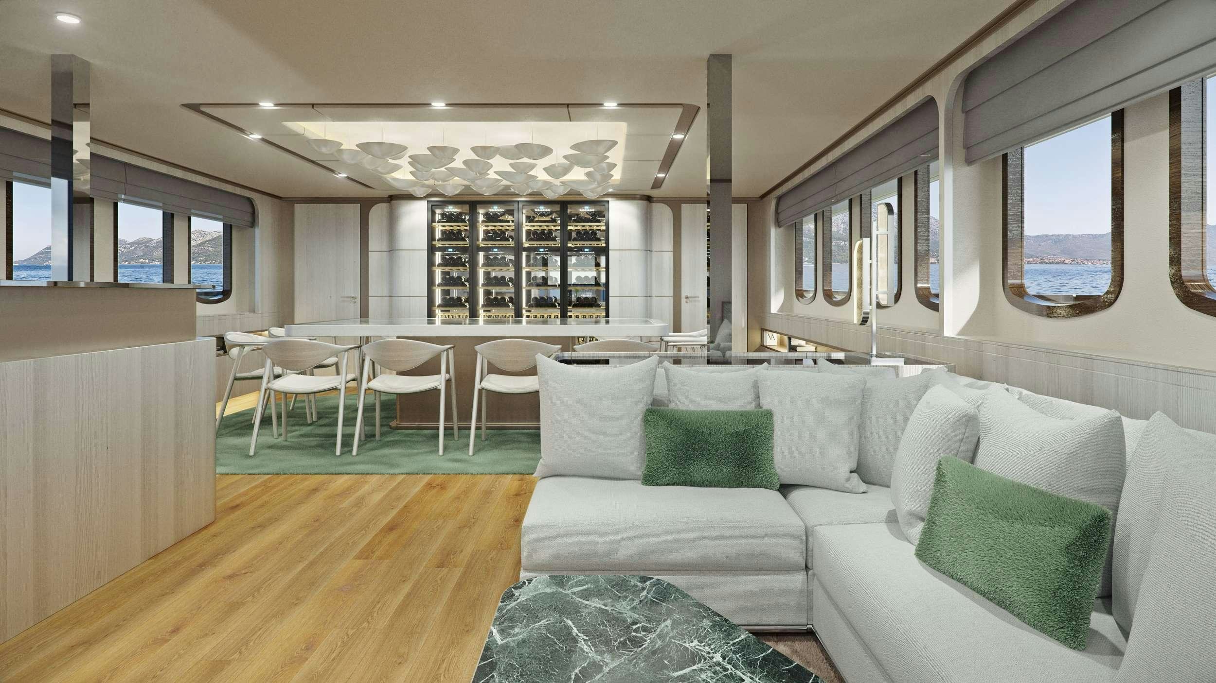 a large room with a couch and chairs aboard MAIA Yacht for Charter