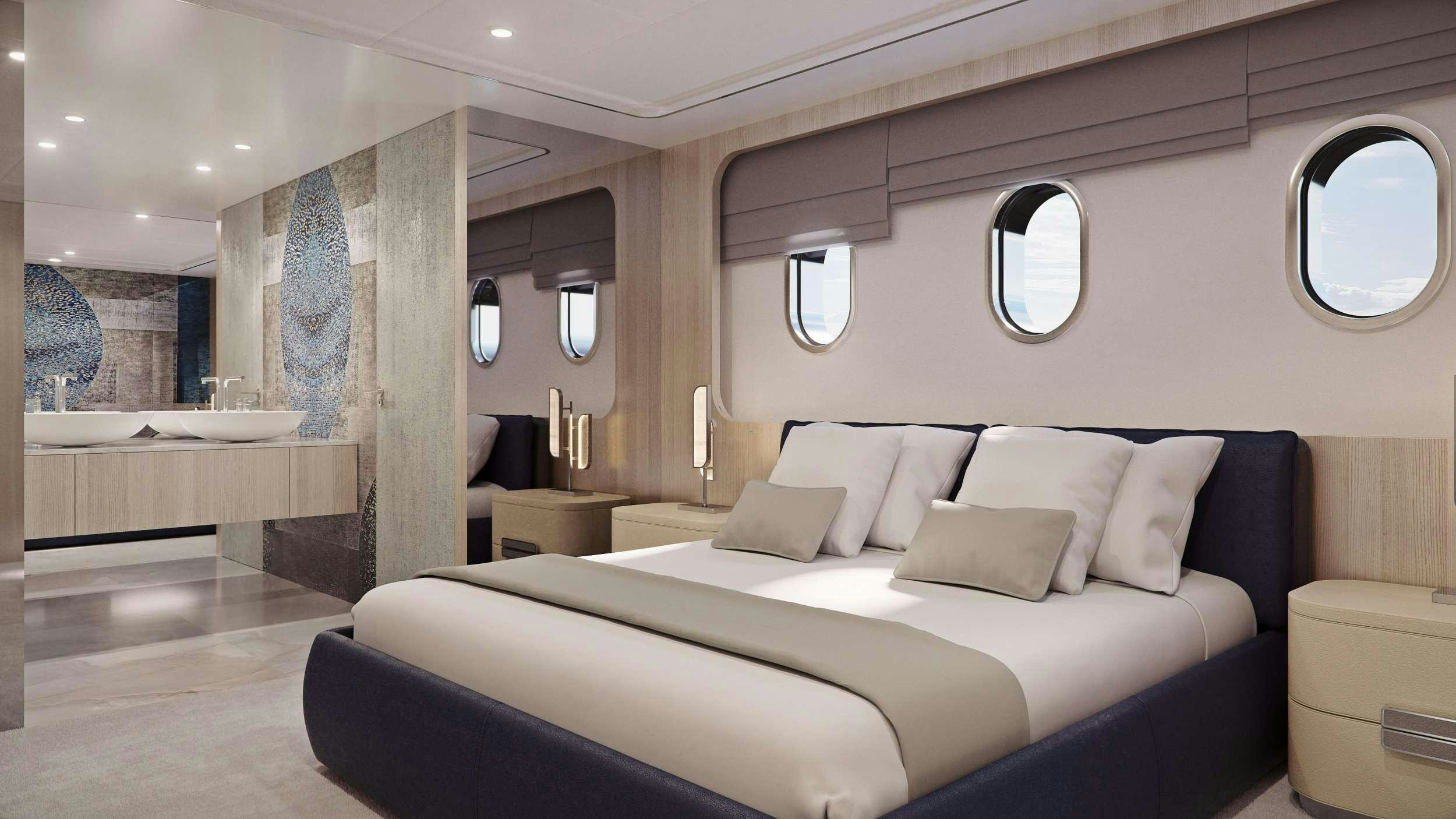 a large bed in a room aboard MAIA Yacht for Charter