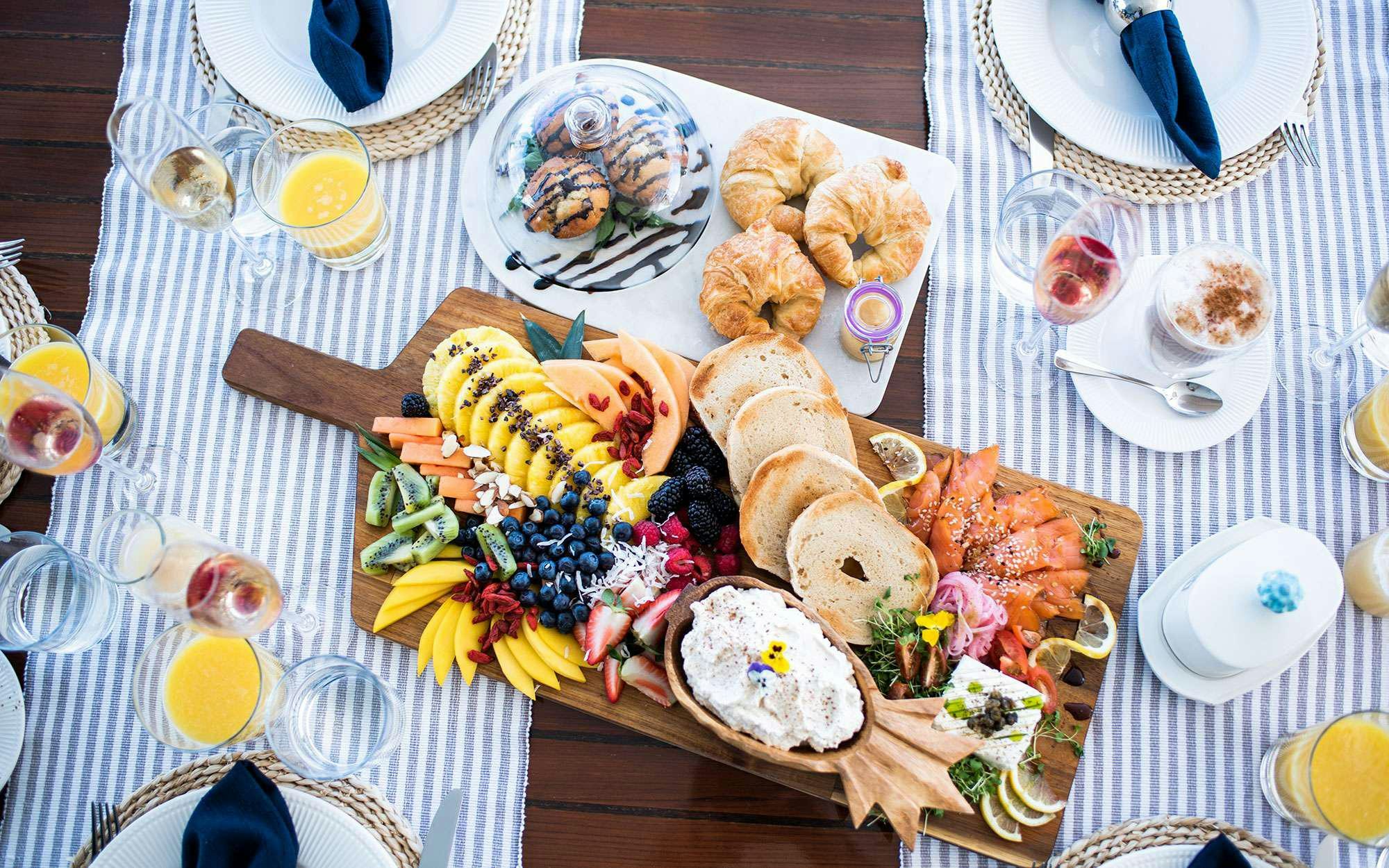 a table full of food aboard BUNDALONG Yacht for Charter