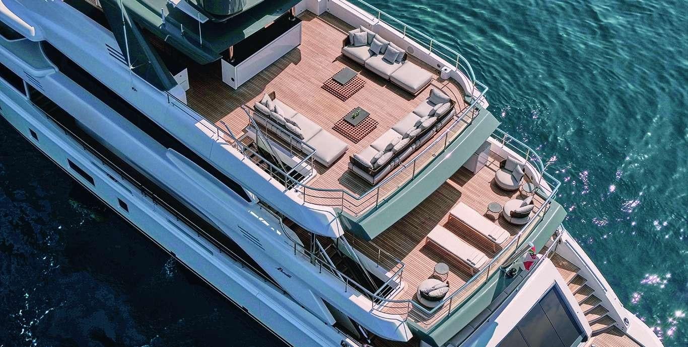 a large building next to a body of water aboard WATERCOLOURS Yacht for Charter