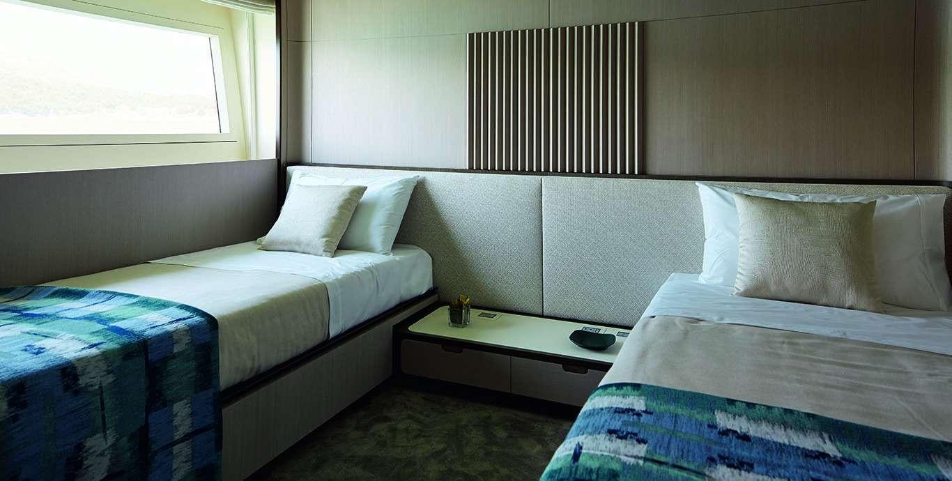 a couple of beds in a room aboard WATERCOLOURS Yacht for Charter