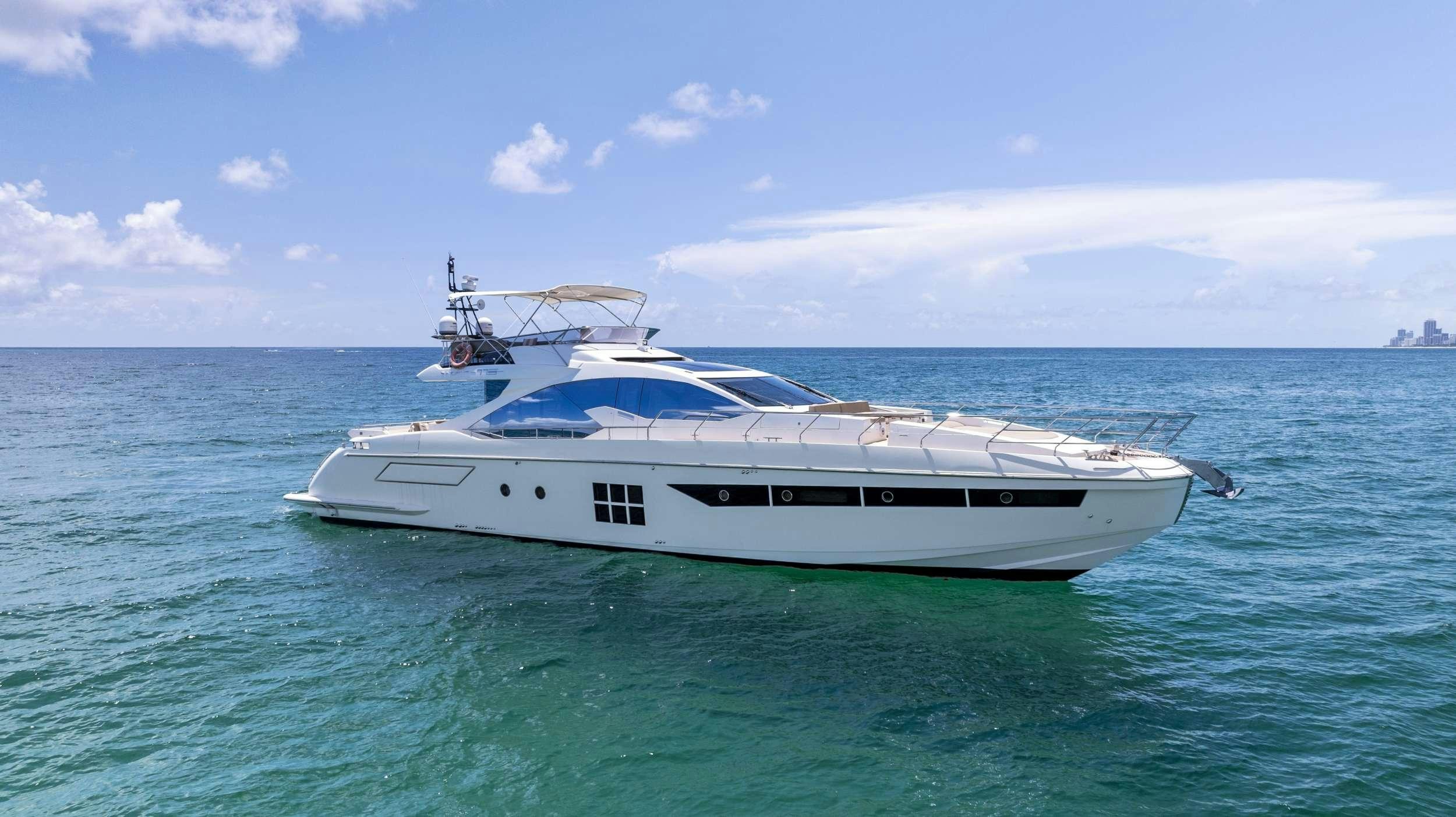 a white boat in the water aboard FANTASTIC Yacht for Charter