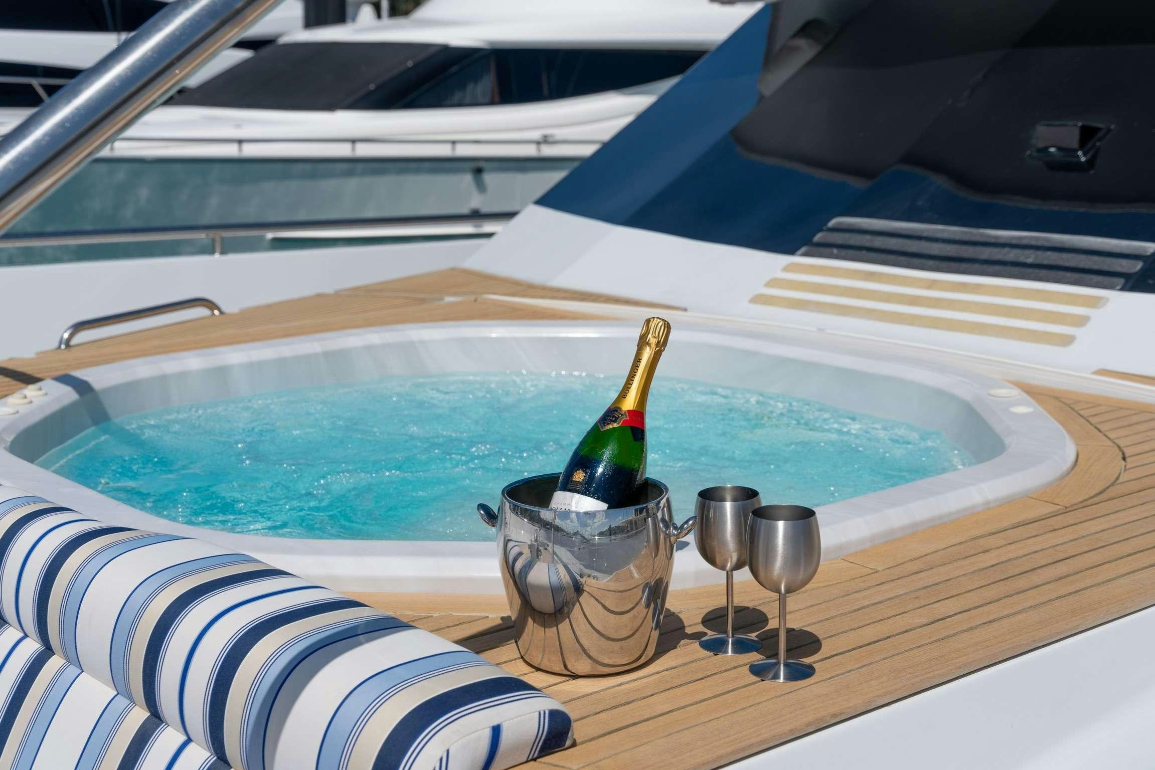 a bottle of wine on a boat aboard SHORETHING Yacht for Charter