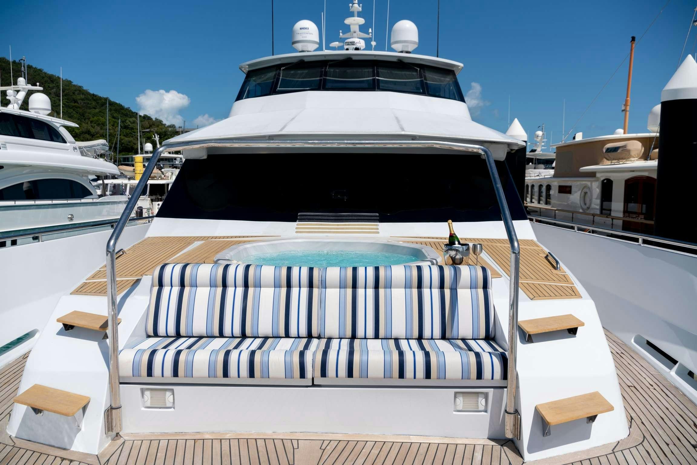 a boat with a white stripe aboard SHORETHING Yacht for Charter