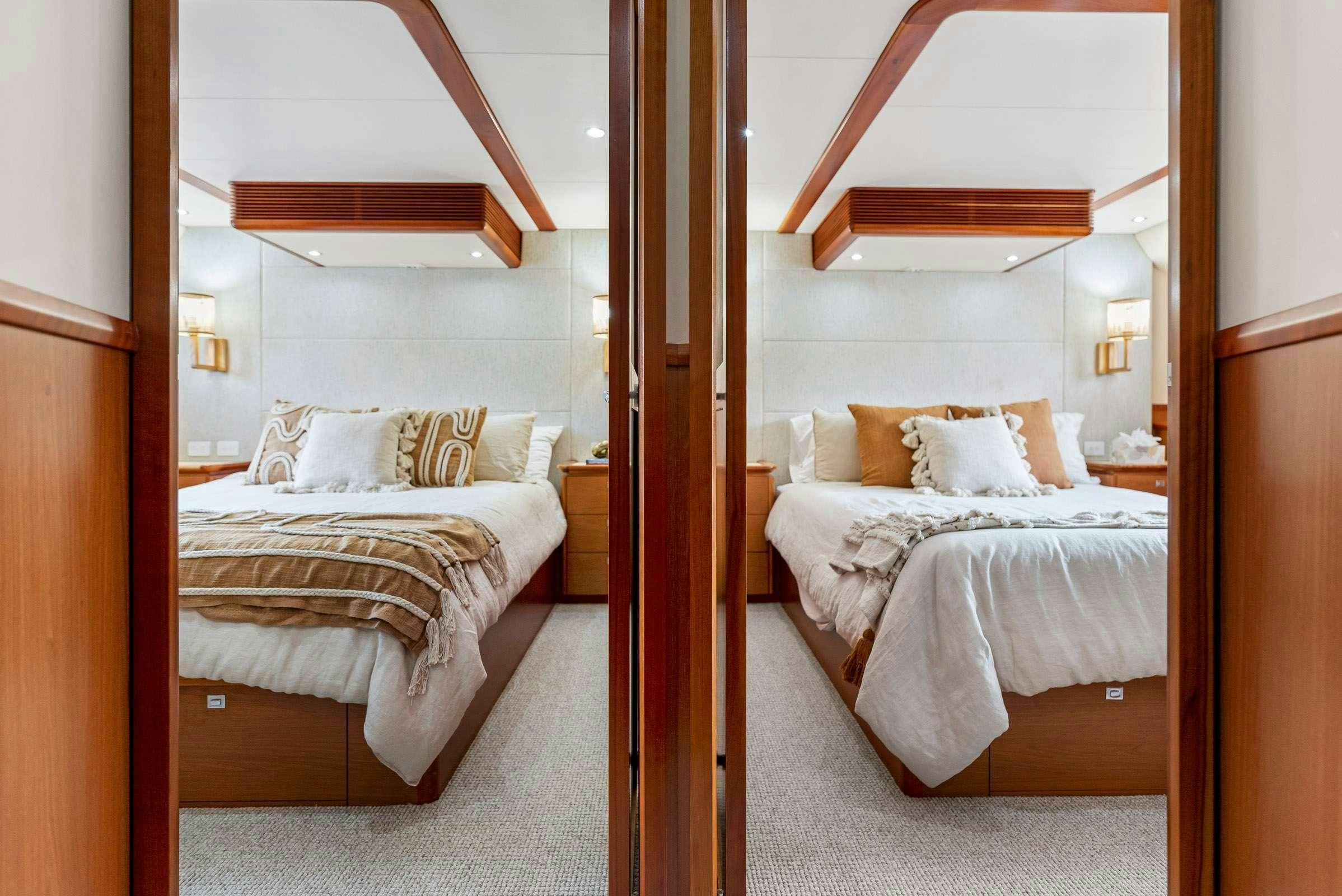 a room with two beds aboard MATRIX III Yacht for Charter