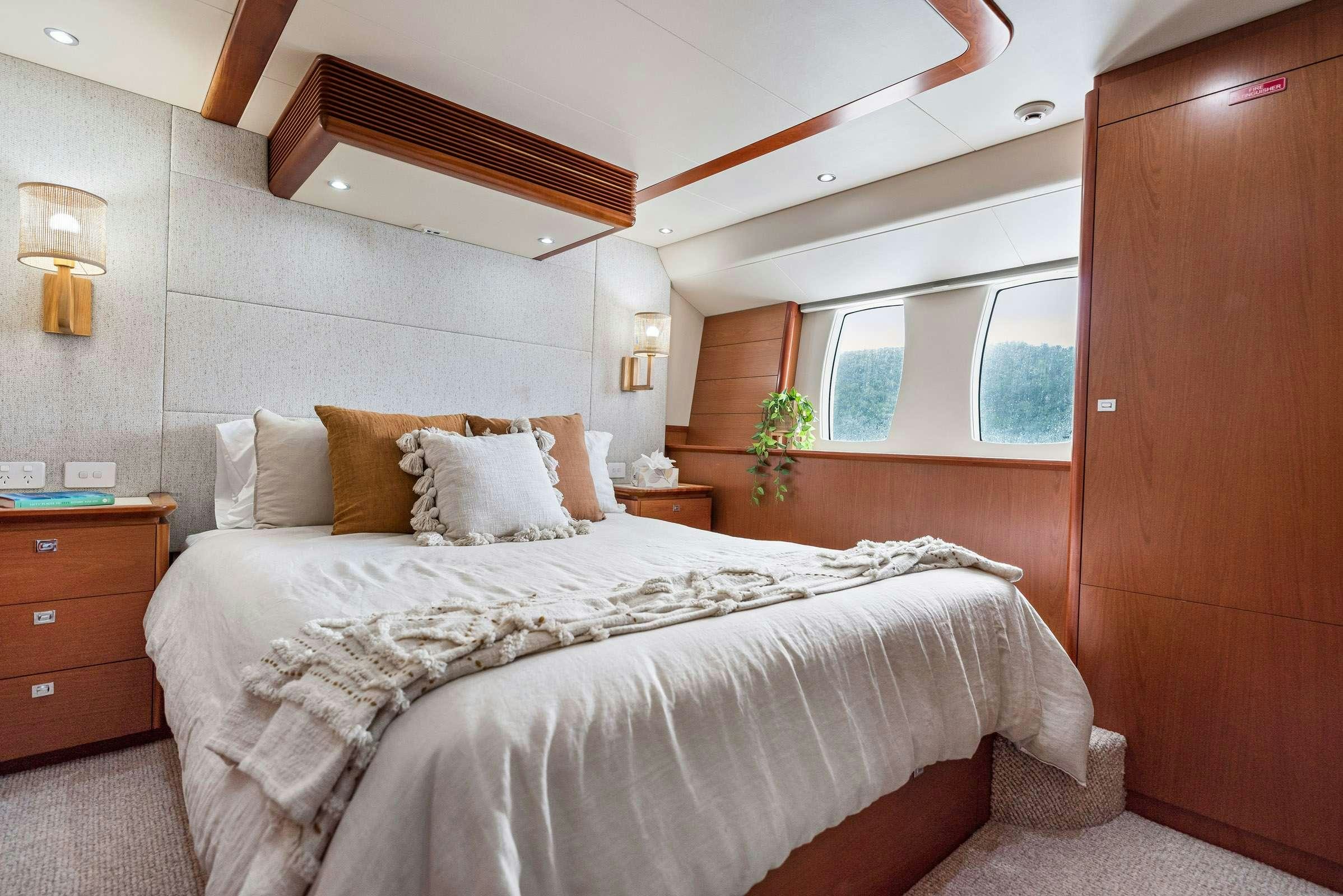 a bed in a room aboard MATRIX III Yacht for Charter