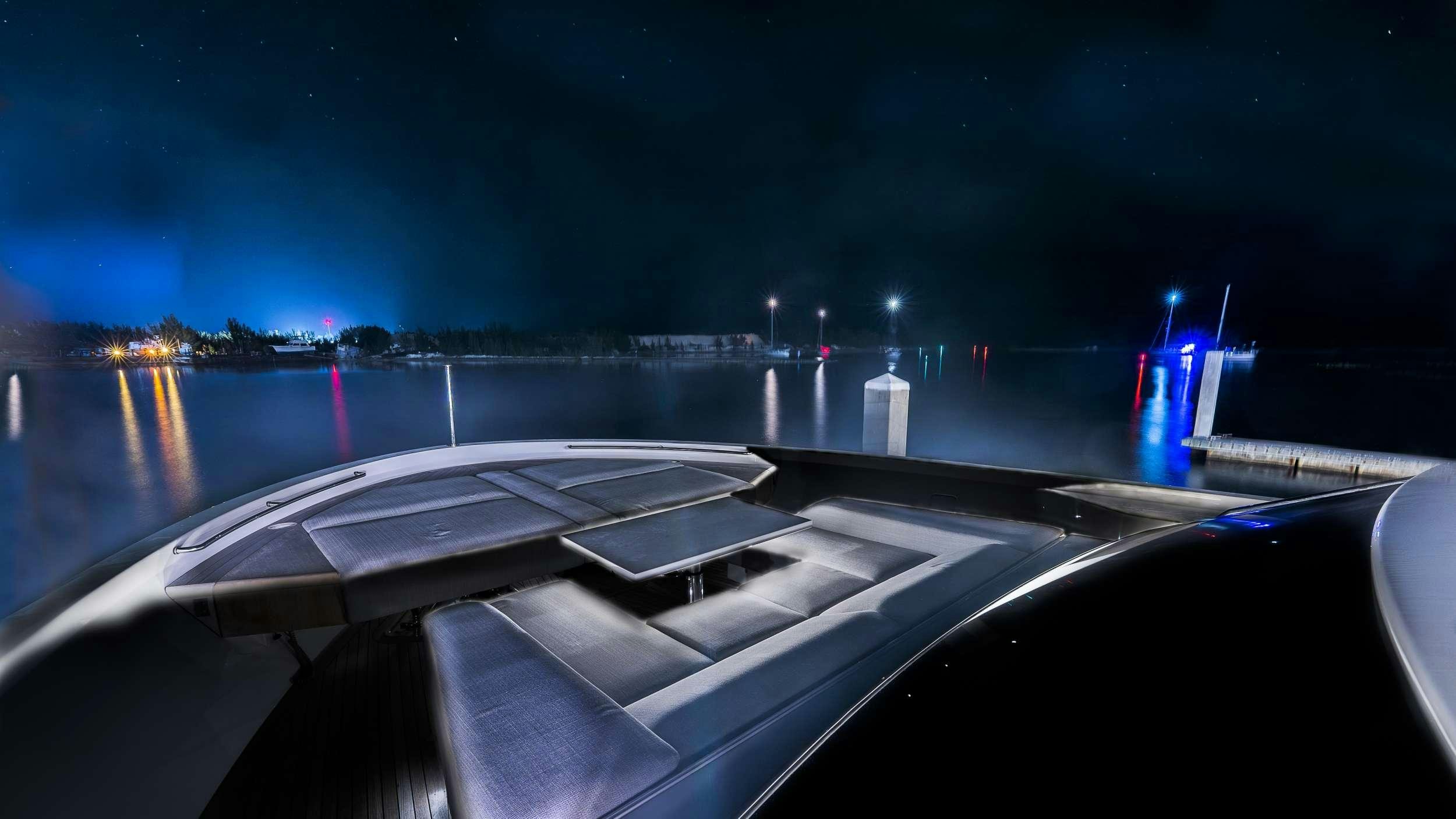 a bridge with lights at night aboard GATSBY Yacht for Charter